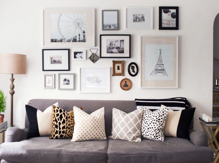 Remember to leave gaps between art pieces to create an arresting wall art gallery.