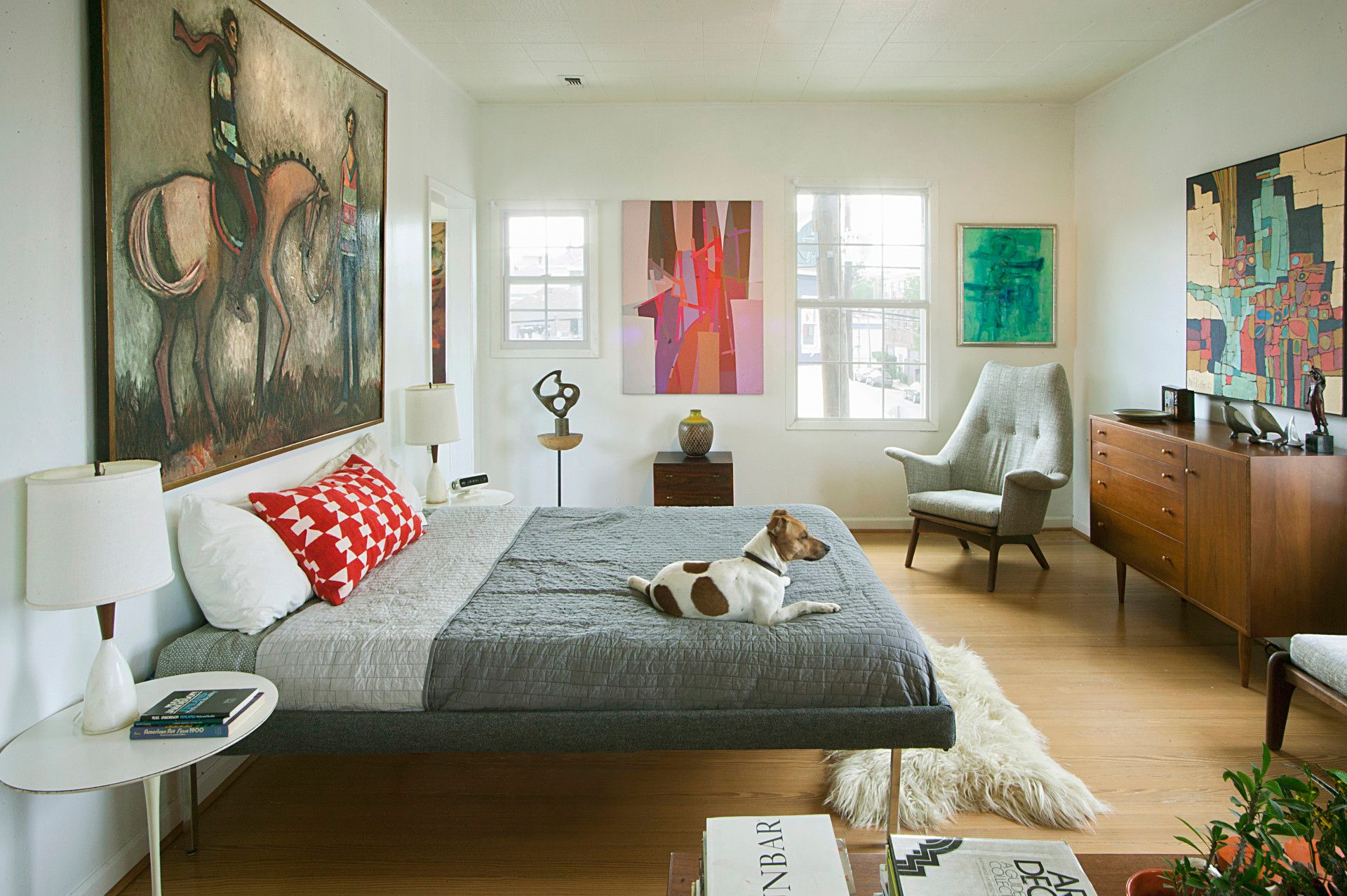 Don't be shy to mix and match when you pick art for your walls.