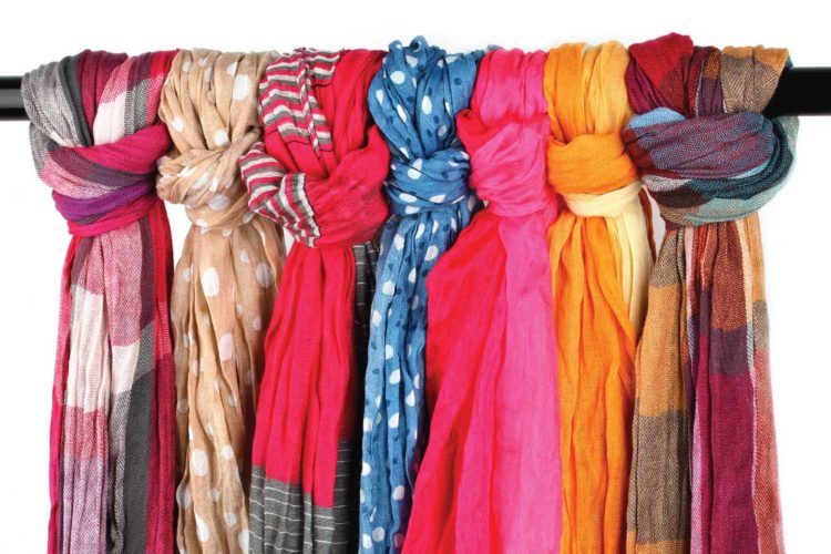 Don't fold your scarves and crease them. Tie them on a rod, instead. Winter wardrobe organisatin_scarves on a rod