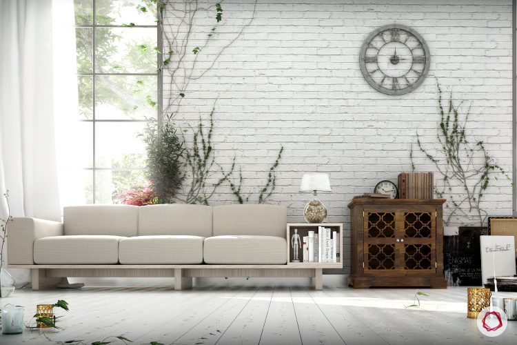 Interior design styles-white exposed brick wall-white couch-table lamp