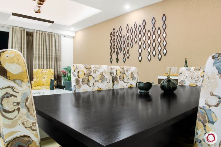 a-dining-room-with-a-yellow-and-black-table-and-chairs