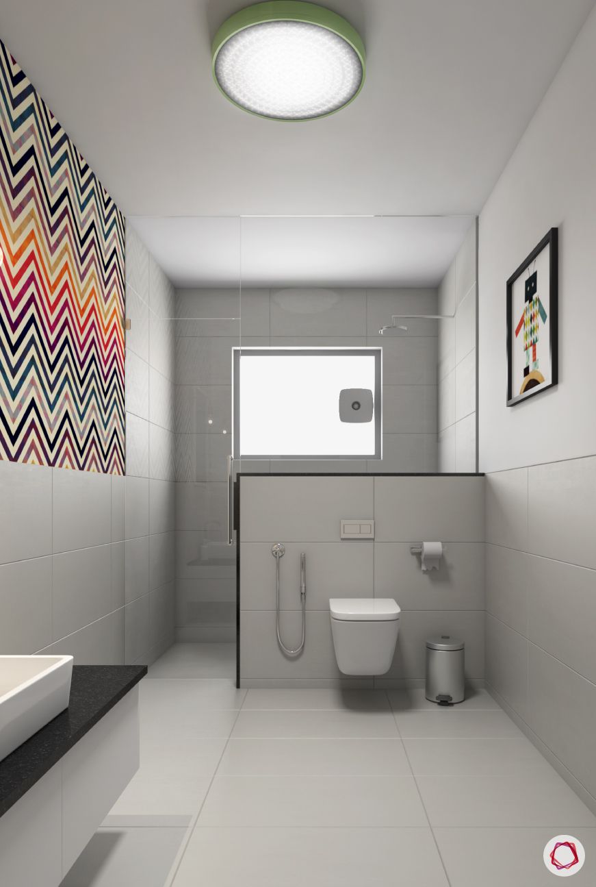 bathroom-white-toilet-wall-patterned-tiles-sink