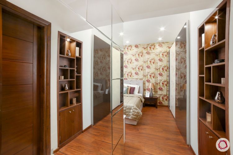 best interior designbest interior design-floral wallpaper-table lamp-side table-display shelf-wooden