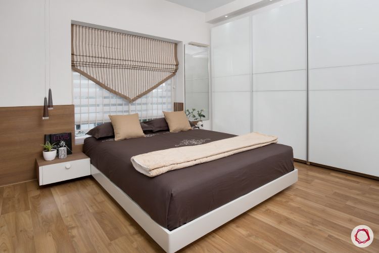 blinds-v-shaped-blind-wooden-flooring-white-wardrobe-bedroom
