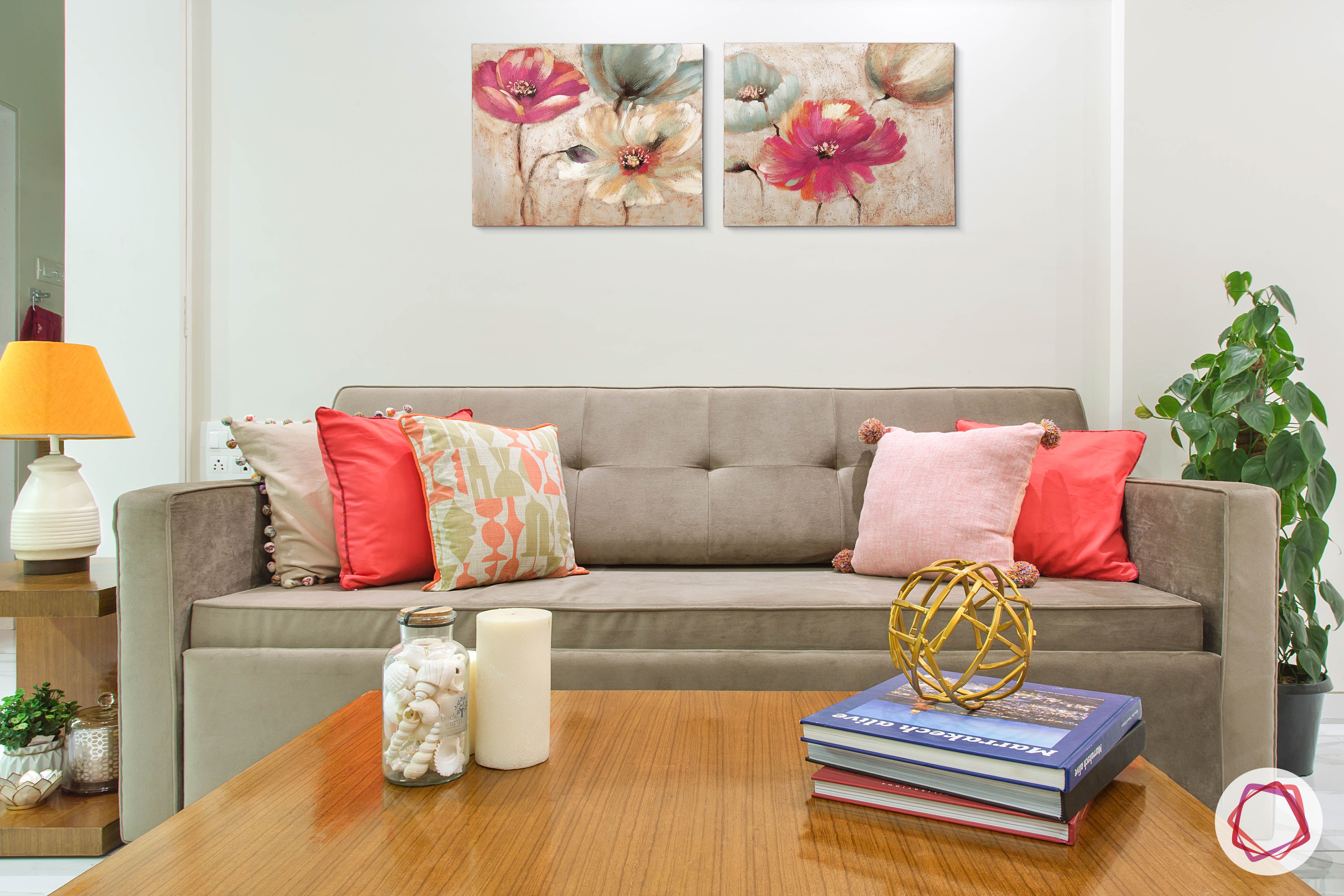 Alia bhatt-living room-interiors-grey sofa-wooden table-pink cushions