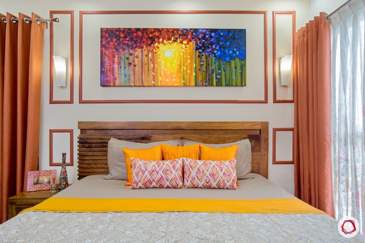 top interior designer master bedroom accent wall with bronze orange trims