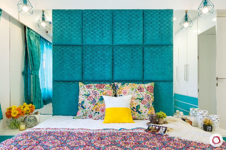 blue-headboard-floral-bedroom