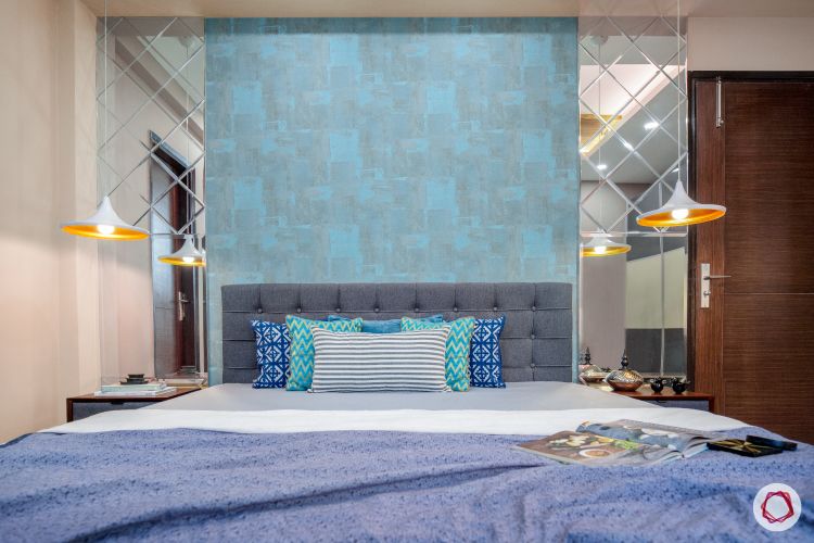 master-bedroom-blue-wall-mirror-panel-light-fixture-bed