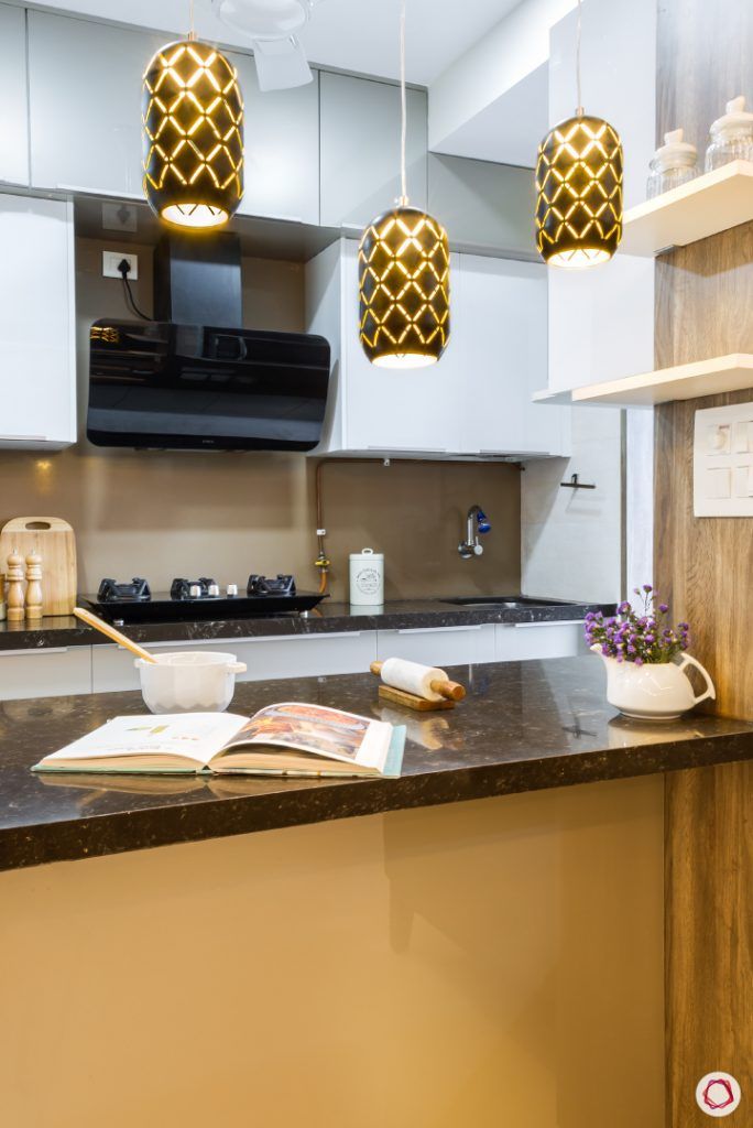 interior design 2 bhk furnished_black pendant lights-breakfast counter designs