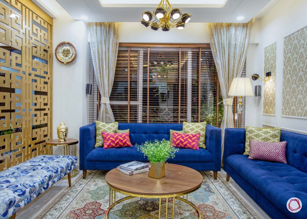 3 bhk flats in noida living room blue sofas
