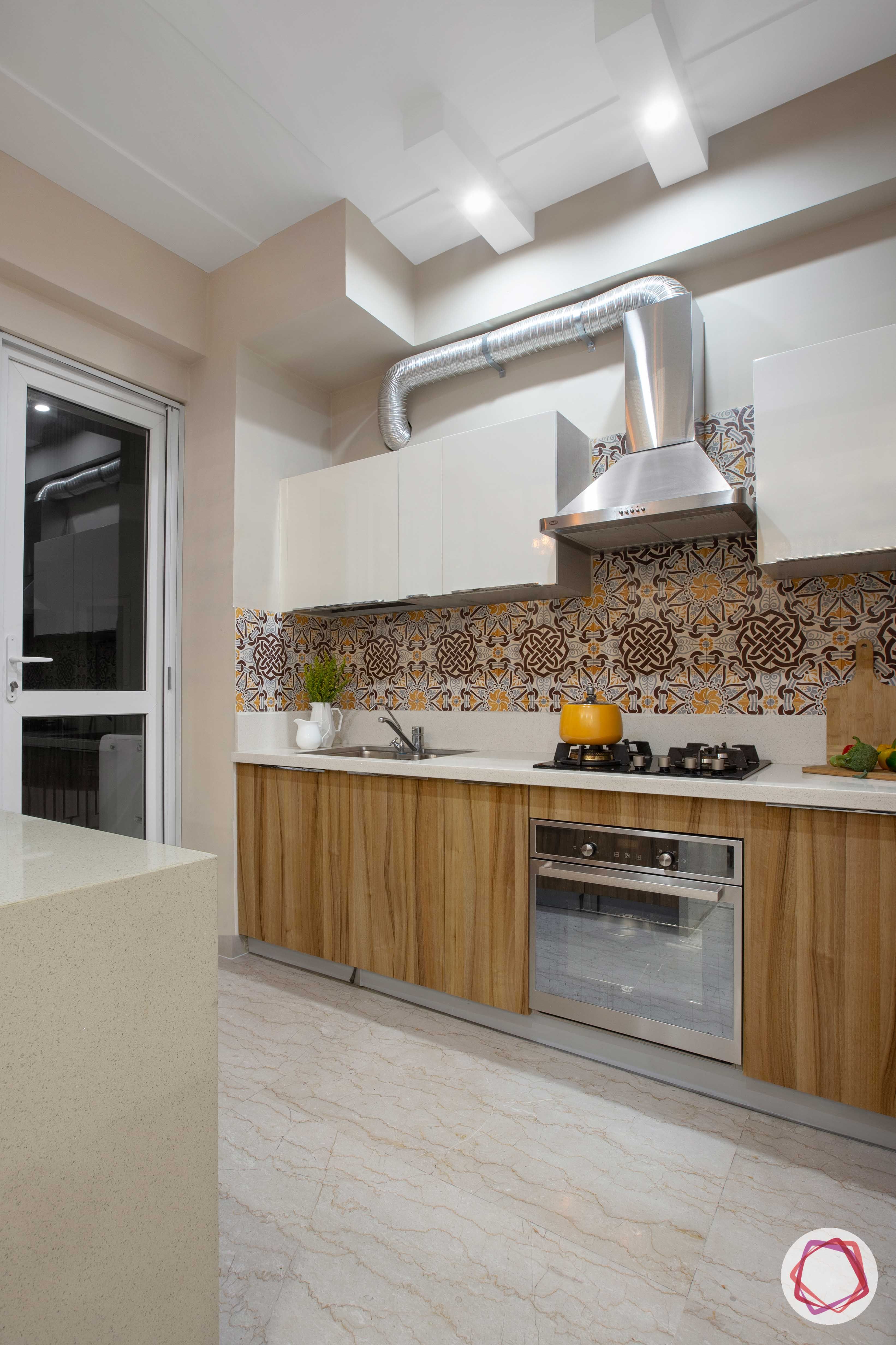 Prateek Stylome-wooden kitchen cabinets-chimney designs