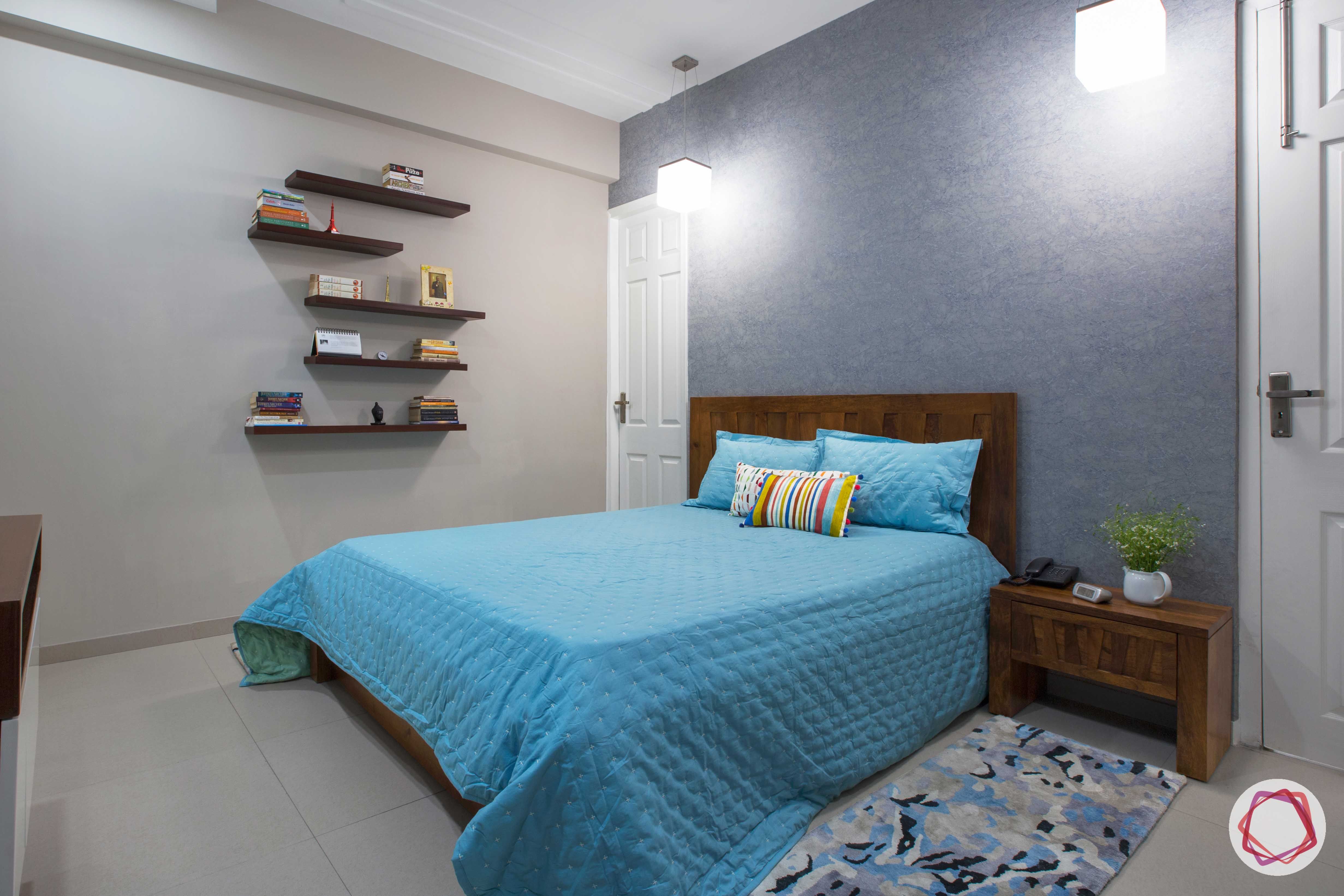 Prateek Stylome-blue wall paint ideas-wooden shelves designs