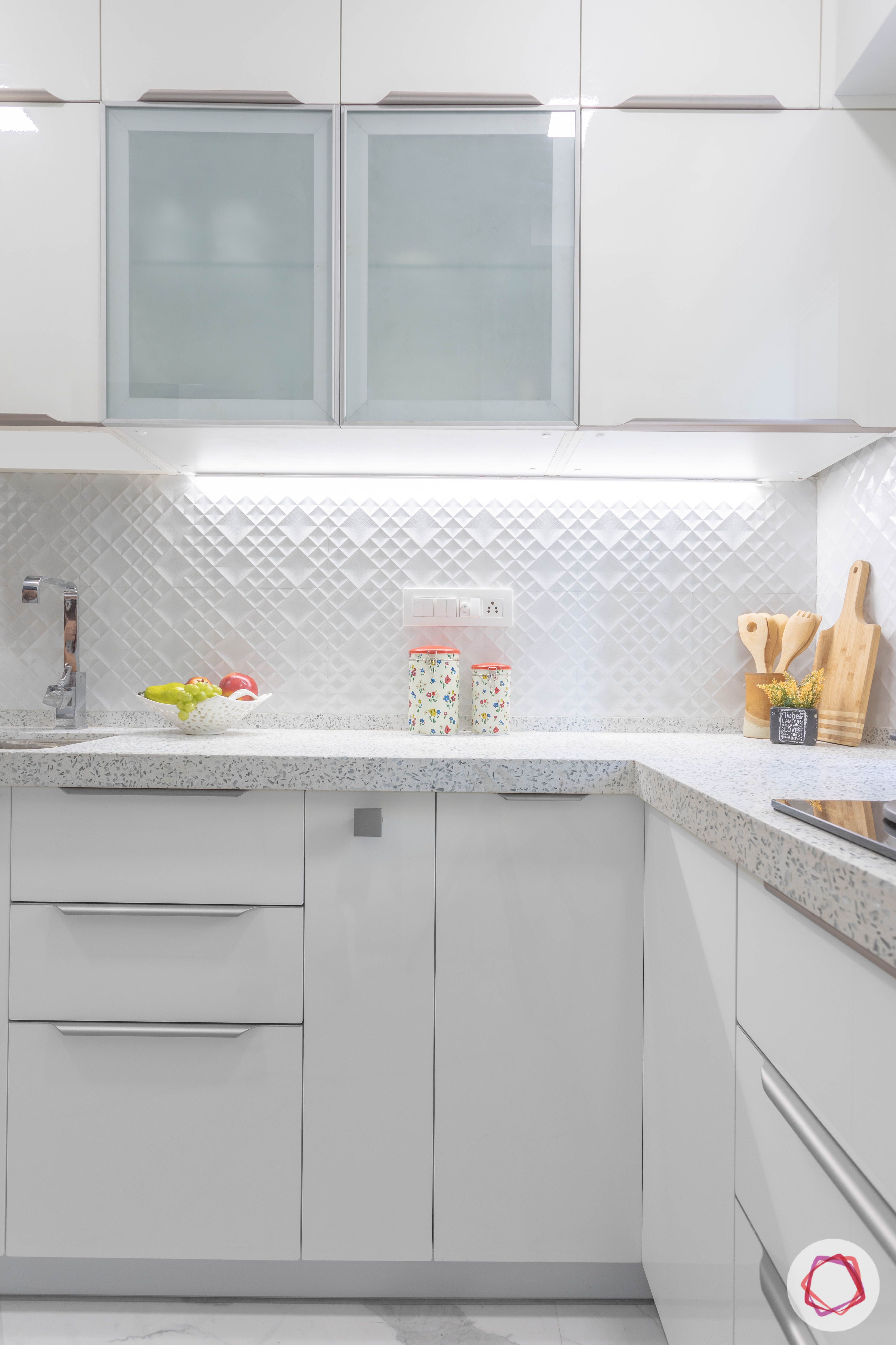 small house plans-white kitchen-frosted glass shutters-white backsplash