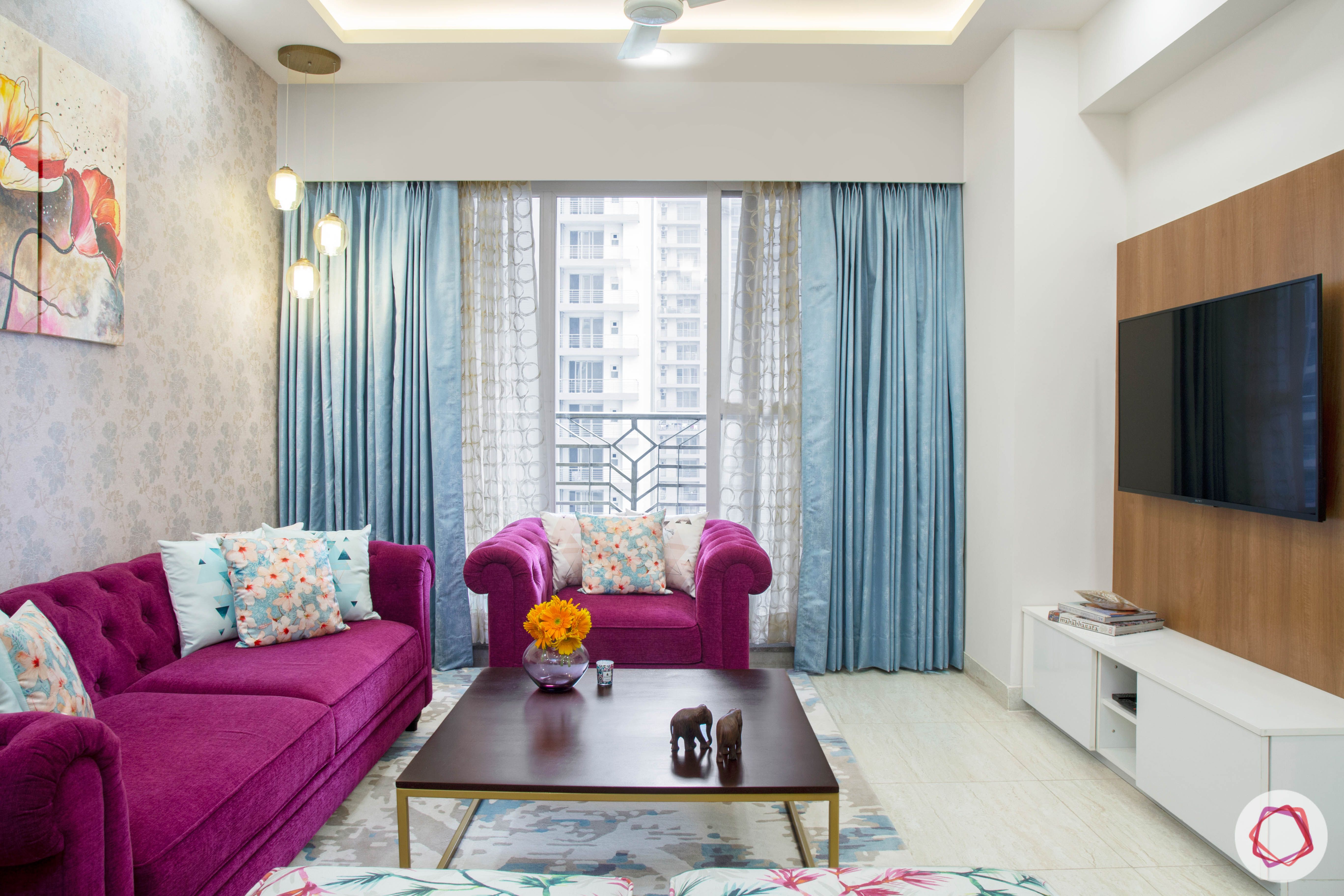 Cleo county noida_living room with sheer drapes and ample lighting