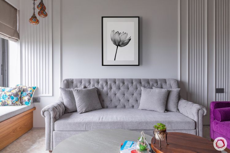 wall paint colours-living room-light grey walls with trims-grey sofa