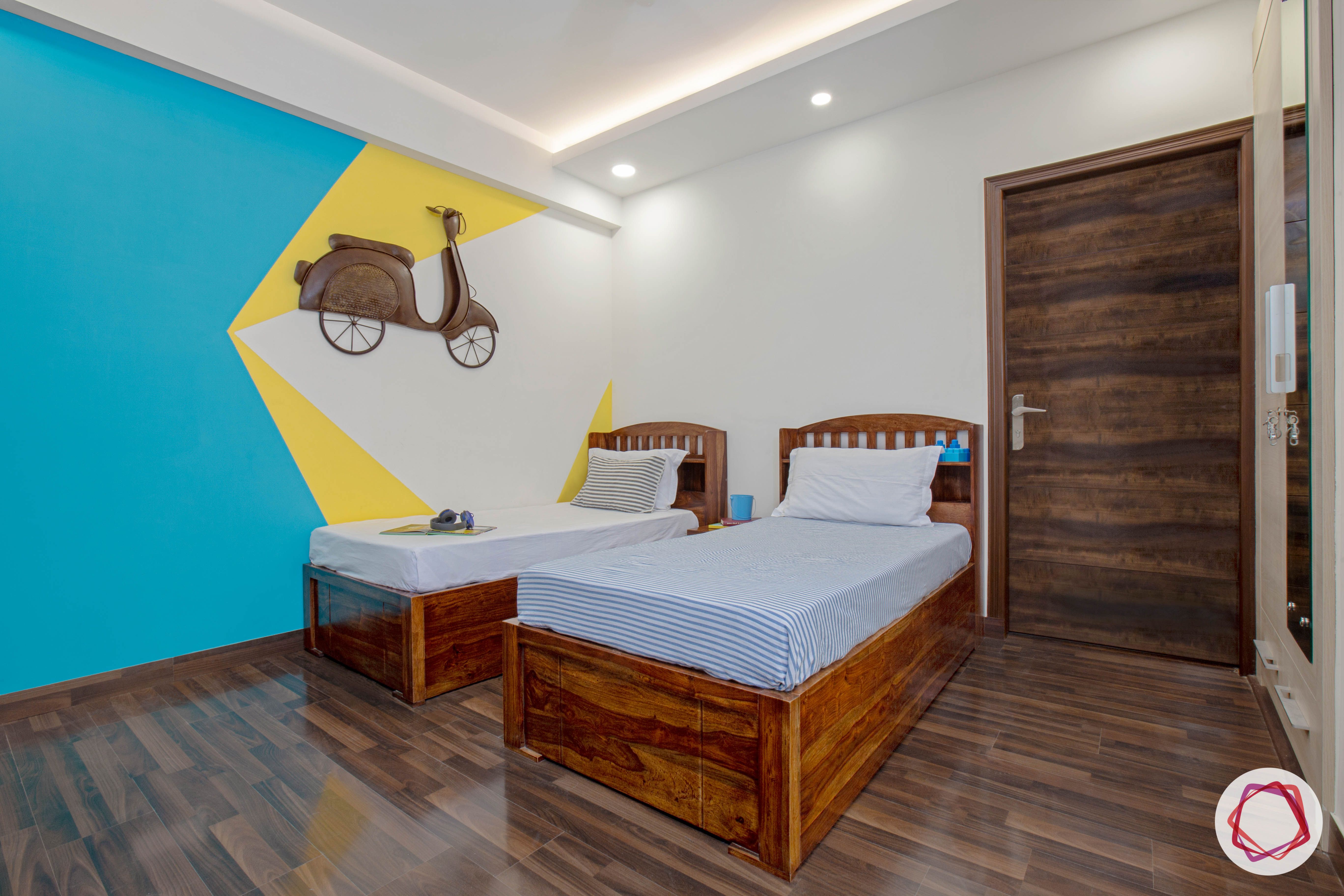 vastu for kids room-wooden-flooring twin-beds wall-art-kids-room