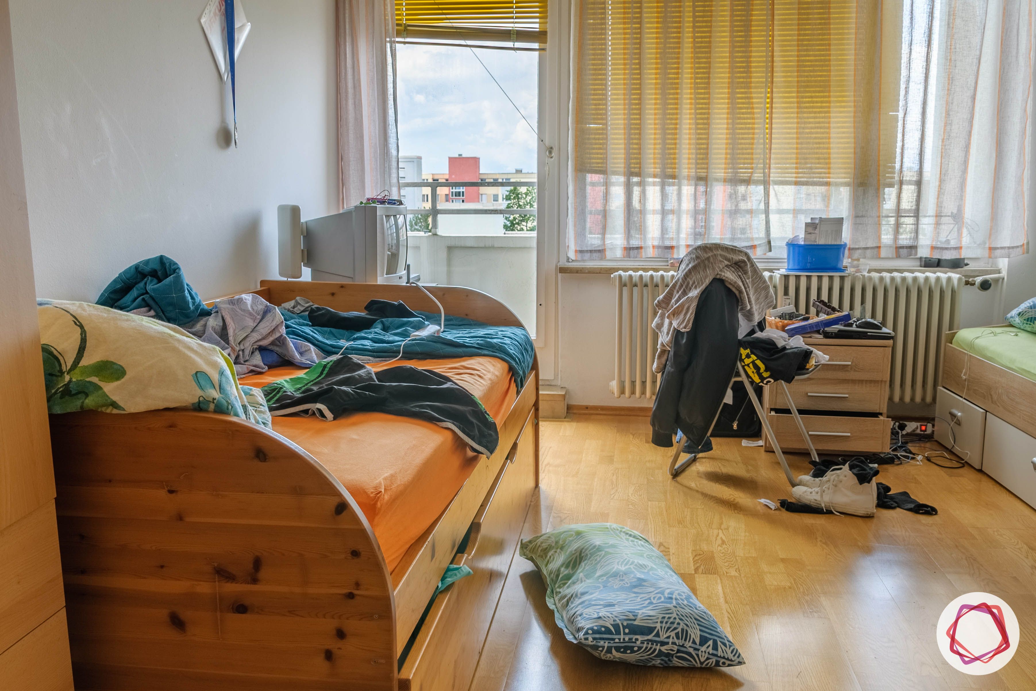 cluttered room wooden-flooring