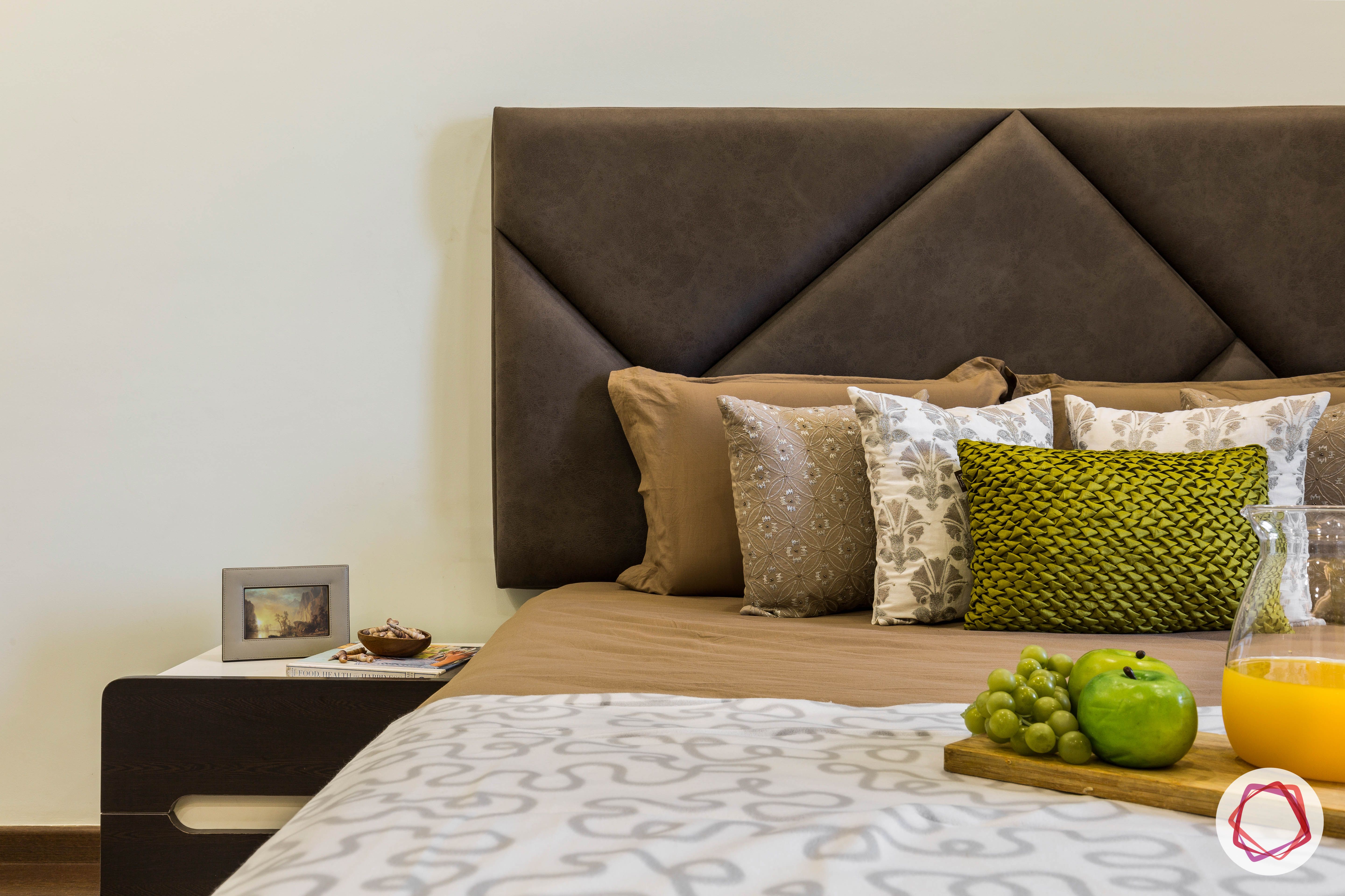 flat interior design-floral master bedroom-headboard-dark grey upholstered headboard
