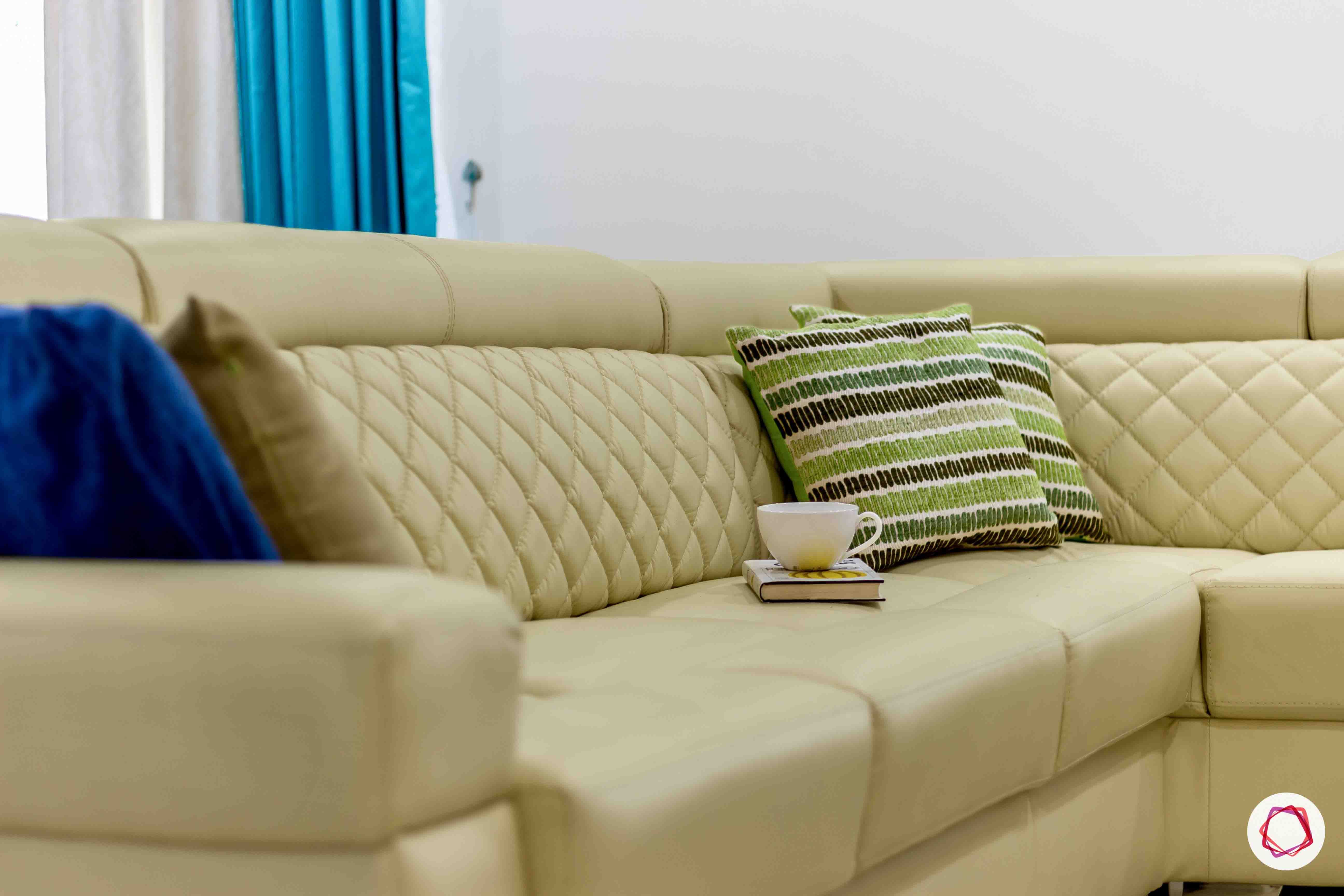 sobha forest view-living room-beige sofa-cushions