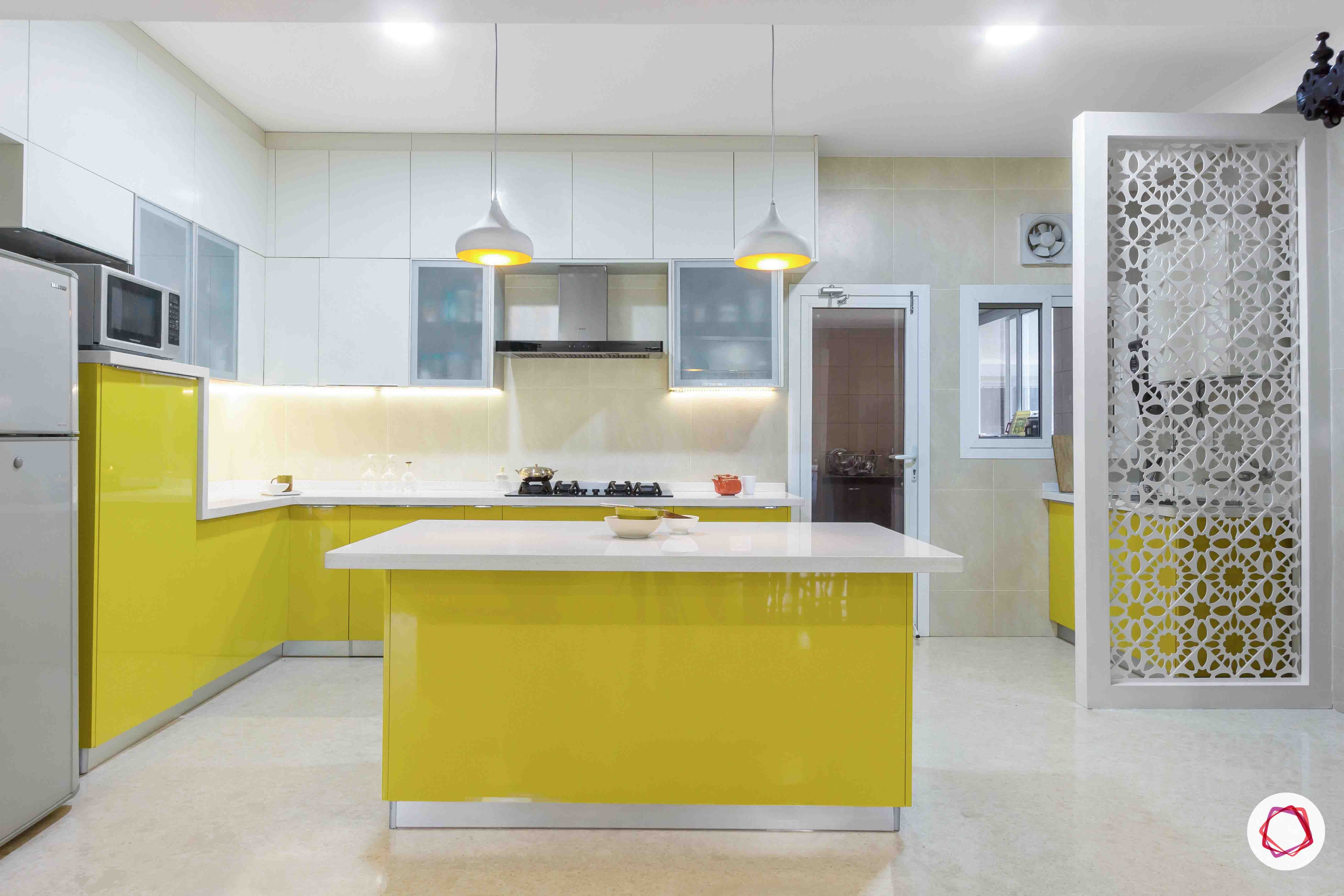 sobha forest view-modular kitchen design-breakfast counter-open kitchen-yellow cabinets-pendant lights