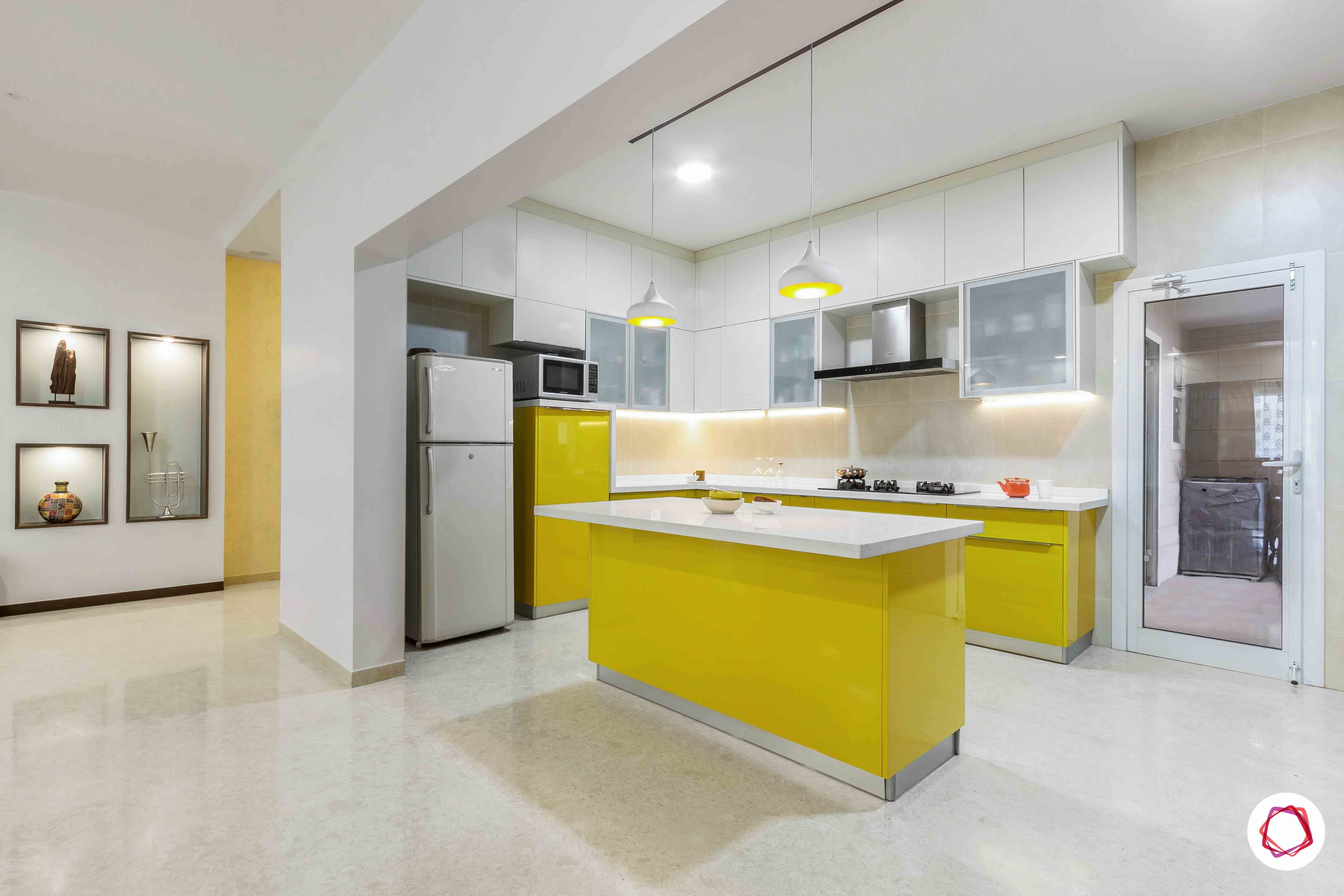sobha forest view-modular kitchen design-open kitchen-breakfast counter-yellow kitchen cabinets