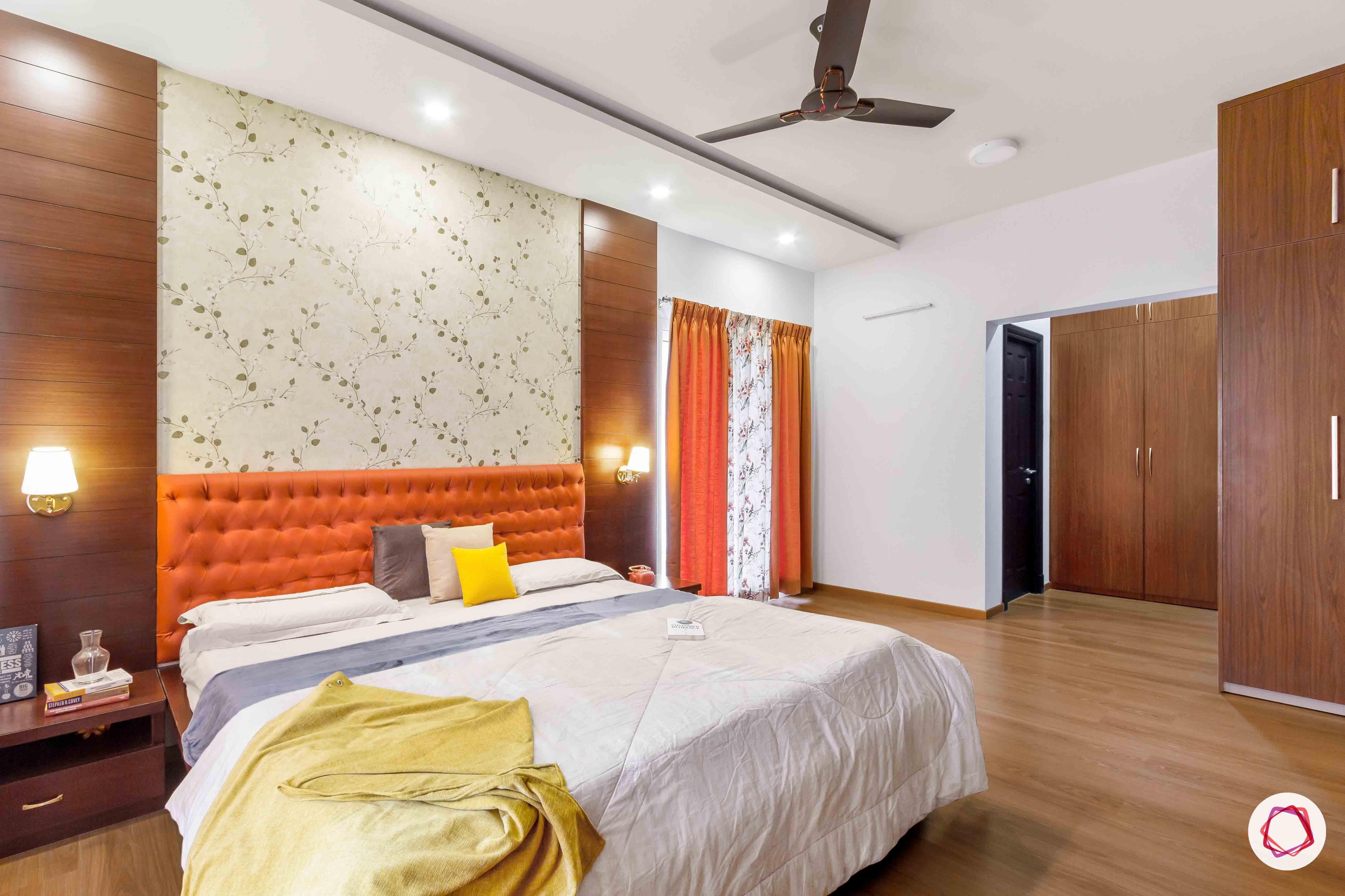 sobha forest view-master bedroom-rust orange-wooden tones-wooden flooring