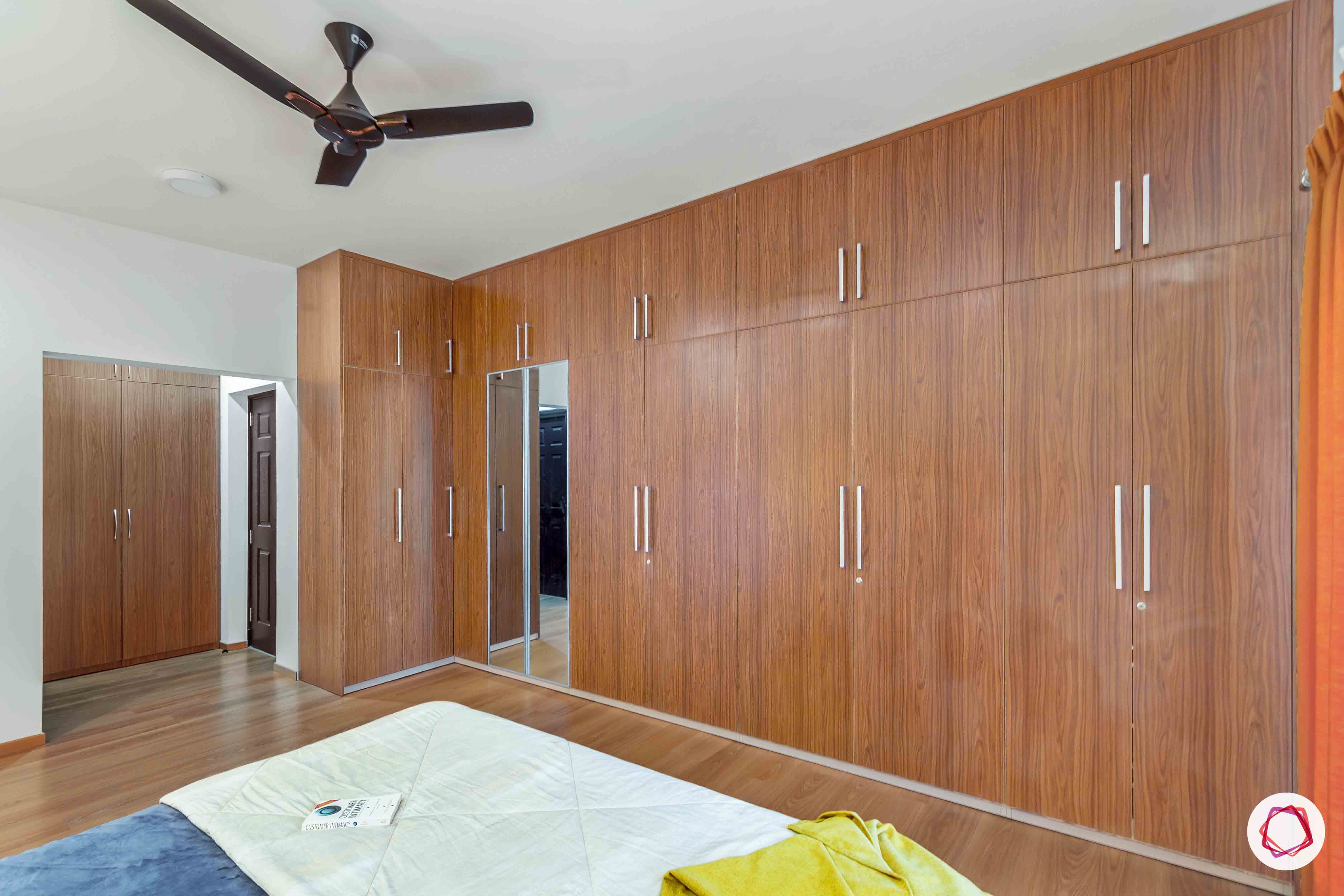 sobha forest view-master bedroom-wooden tones-swing door wardrobes