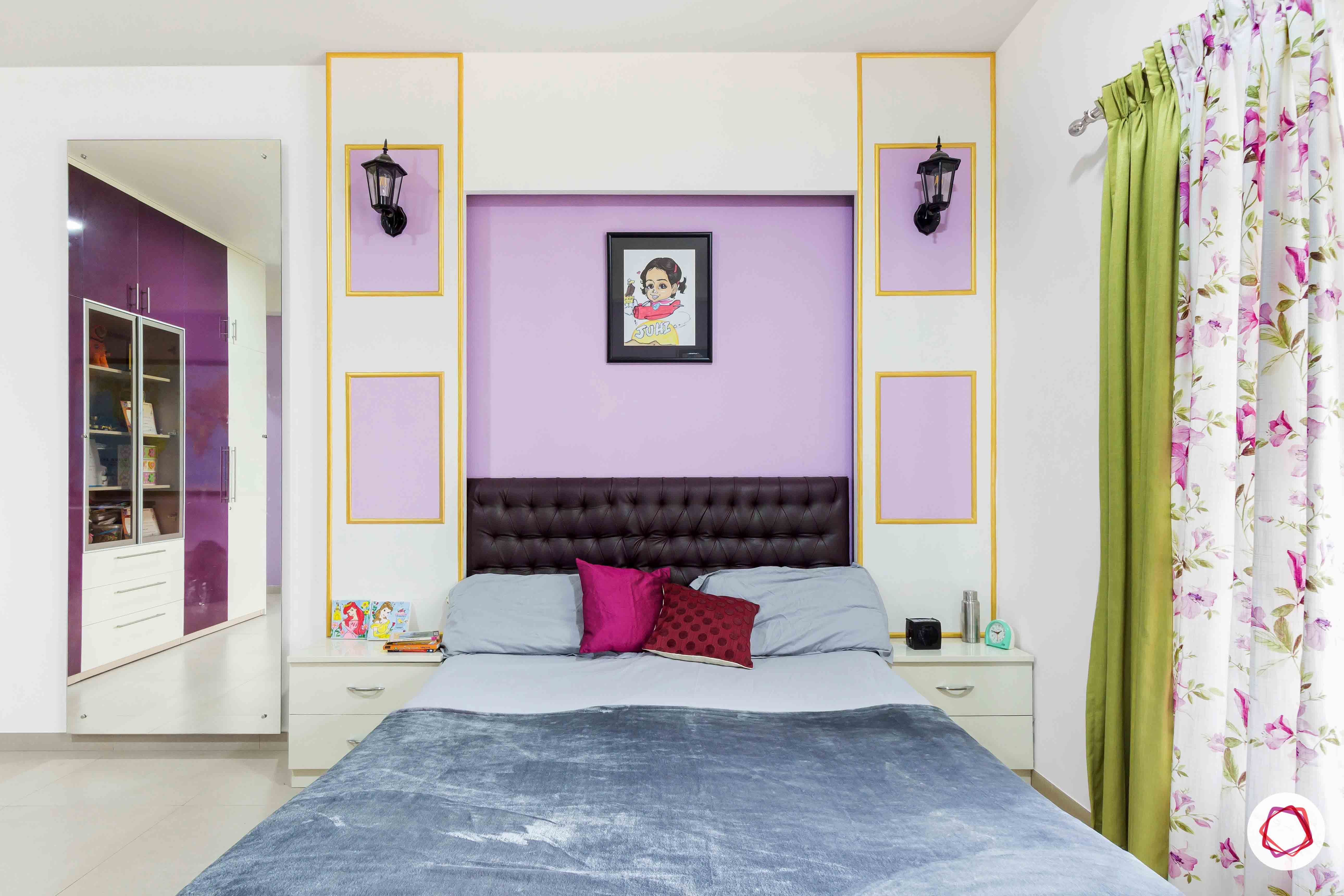 sobha forest view-girls bedroom-purple room-white side tables-tufted headboard-wall lamps