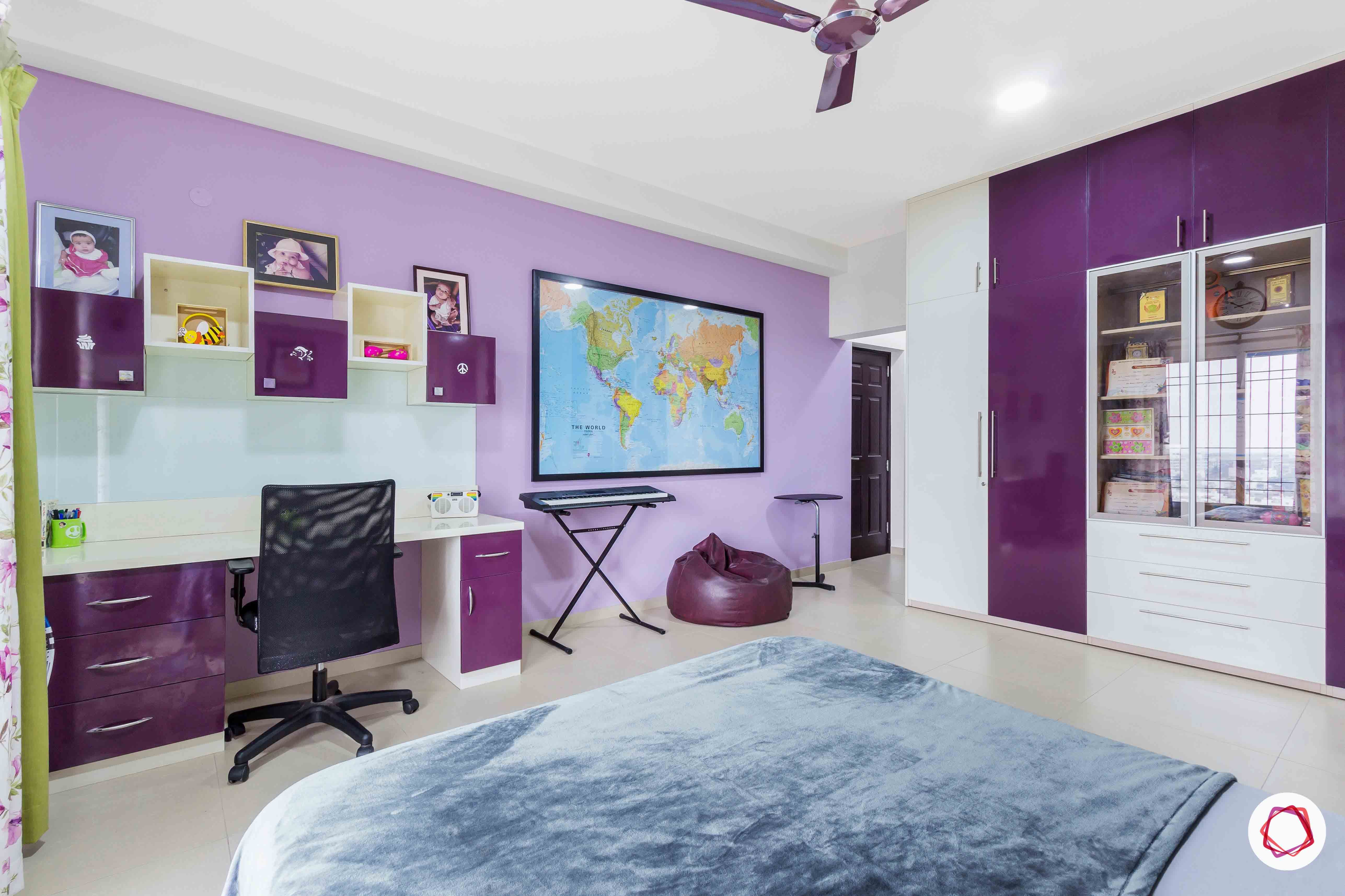 sobha forest view-daughter’s bedroom-purple room-study table with cabinets-piano