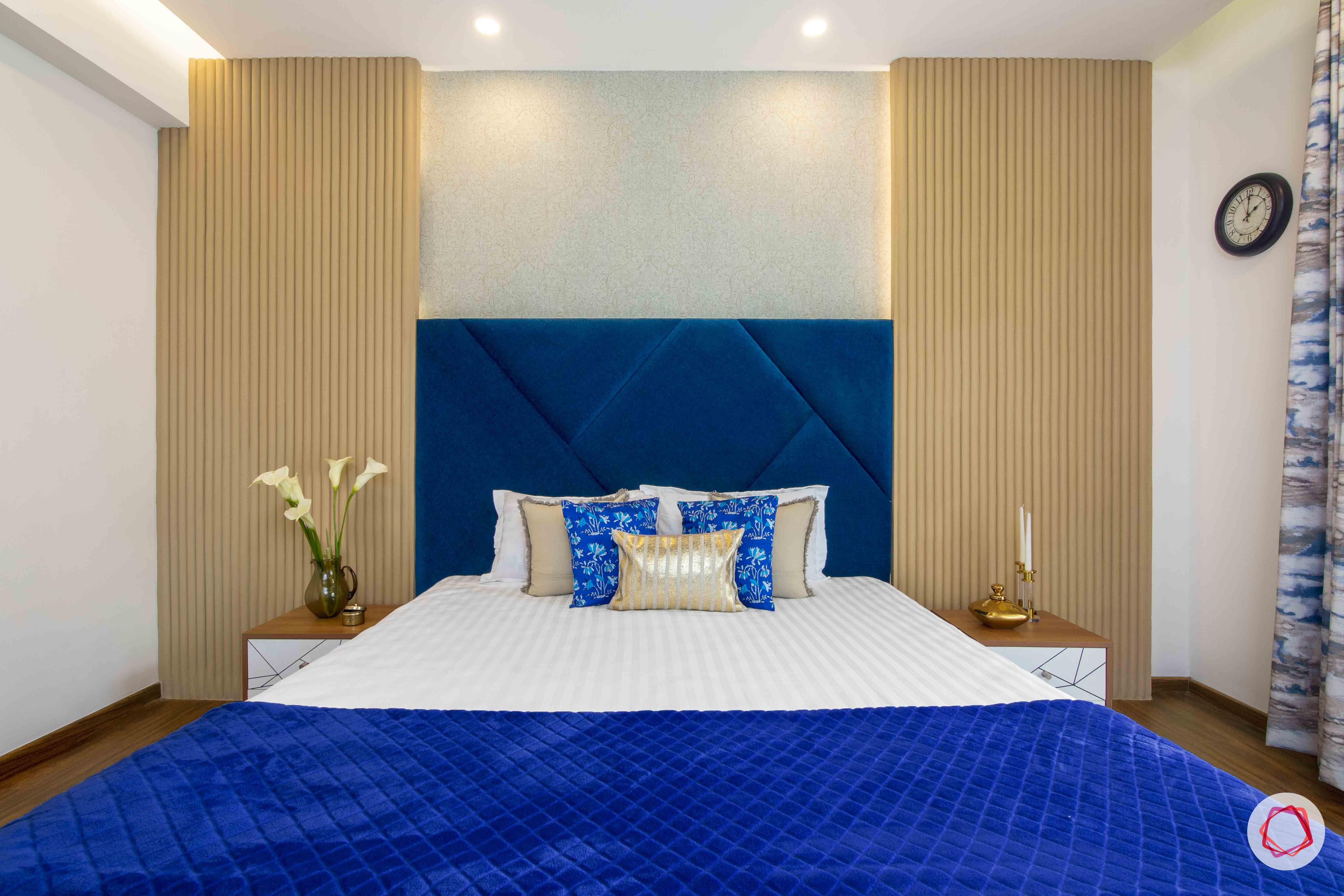 3 bedroom flat design-master bedroom decor-fabric headboard-side table designs-types of wall panelling