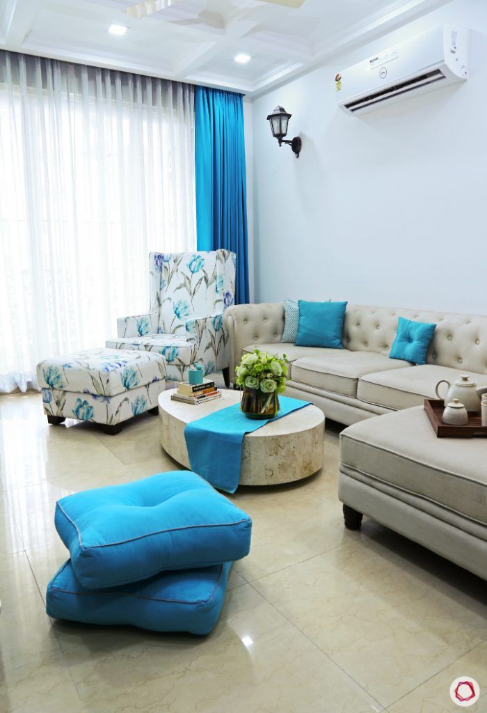small space interior design-throw cushions-living room seating-floor seating ideas-blue cushions
