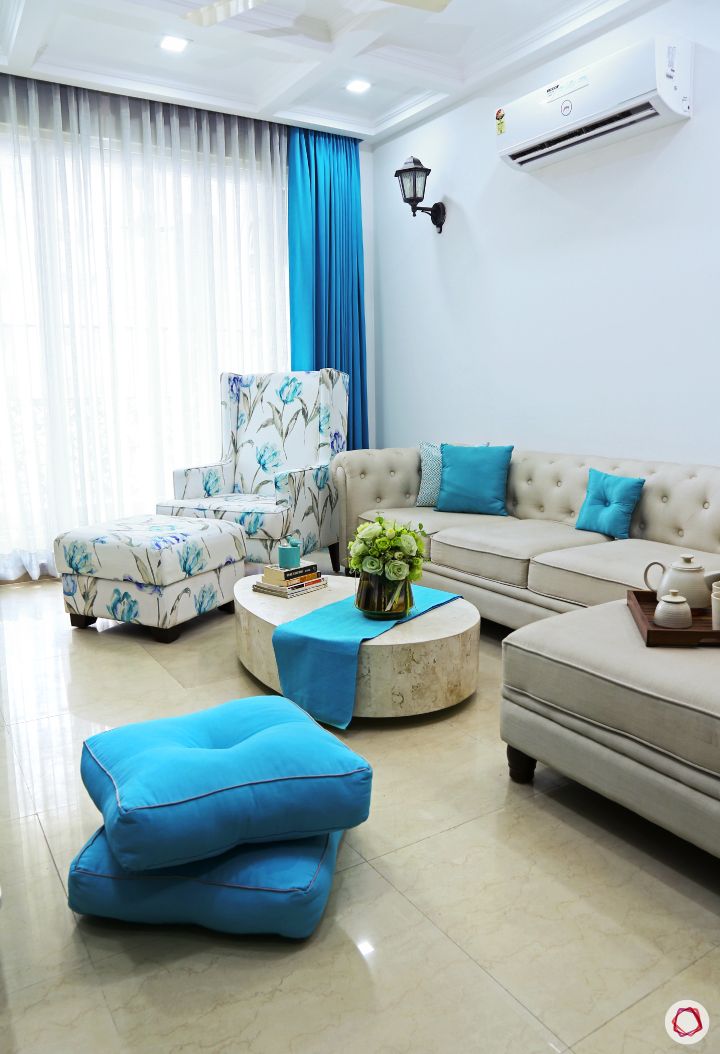 small-space-interior-design-throw-cushions-living-room-seating-floor-seating-ideas-blue-cushions
