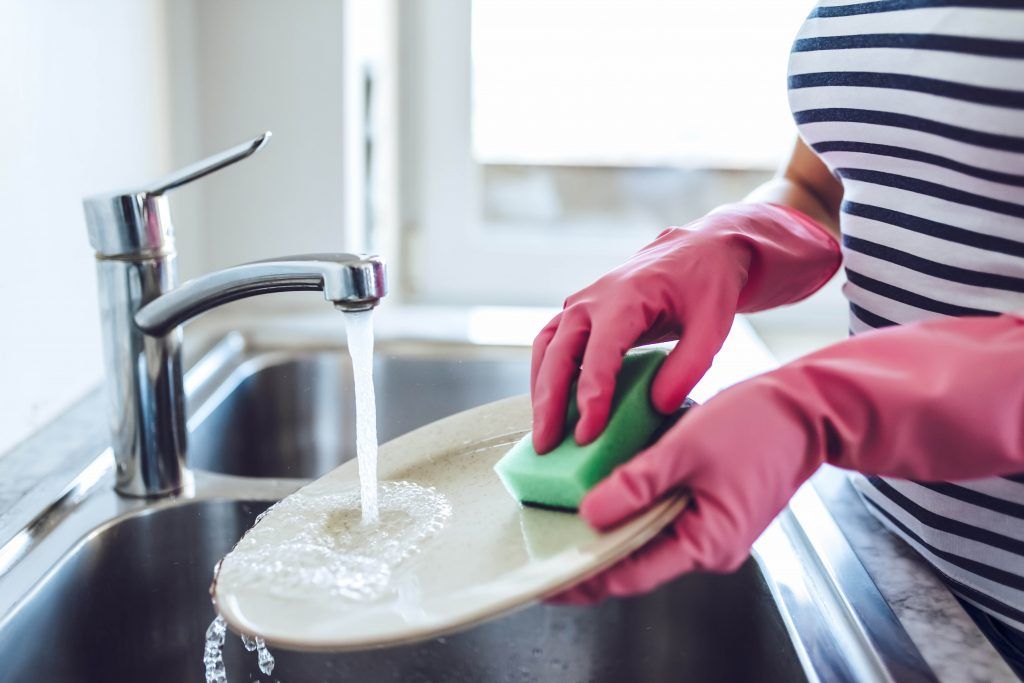 housekeeping-checklist-kitchen-washing-dishes-rubber-gloves