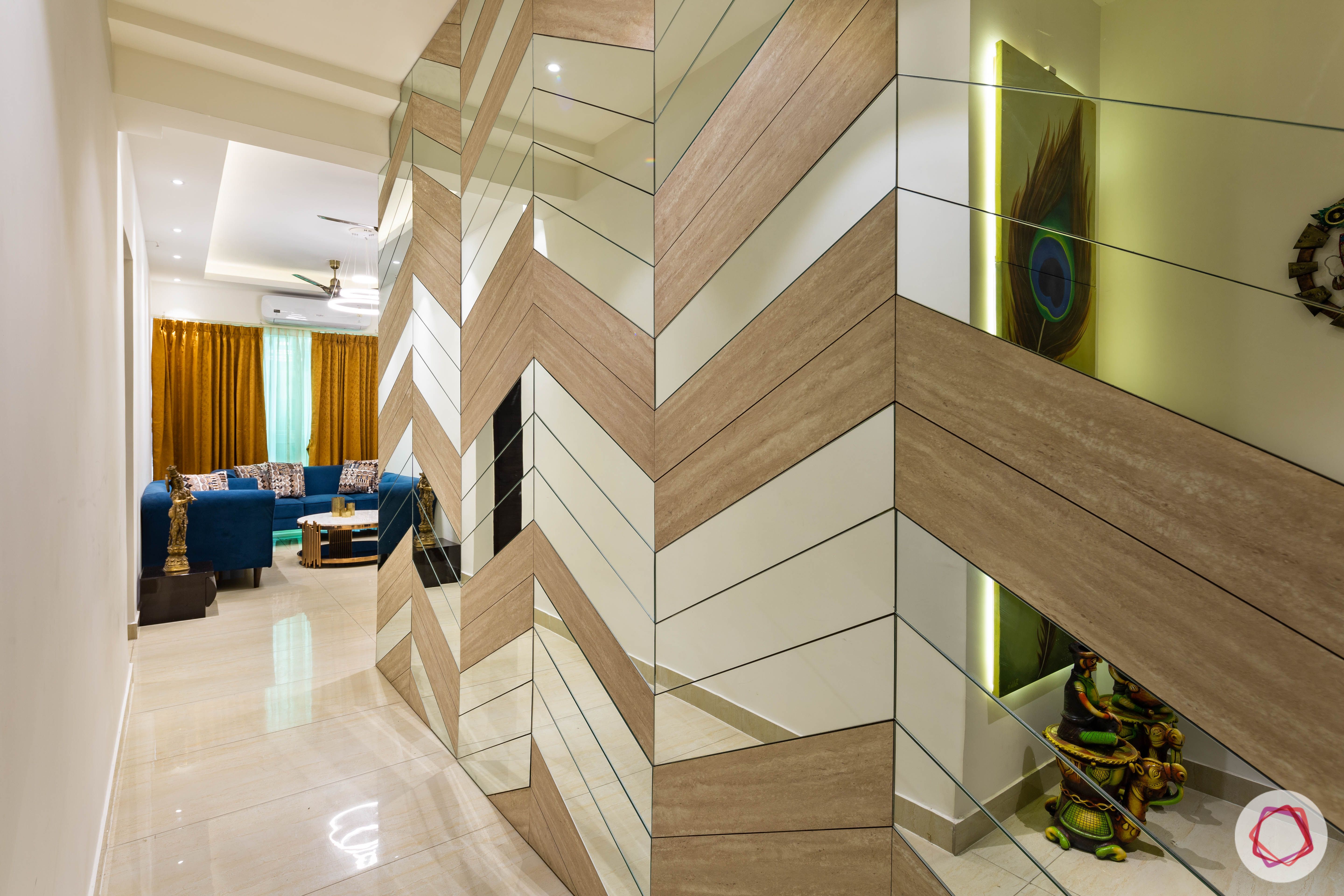 3 bhk flat-home entrance-foyer-wall paneling-wooden and mirror wall panel-chevron pattern