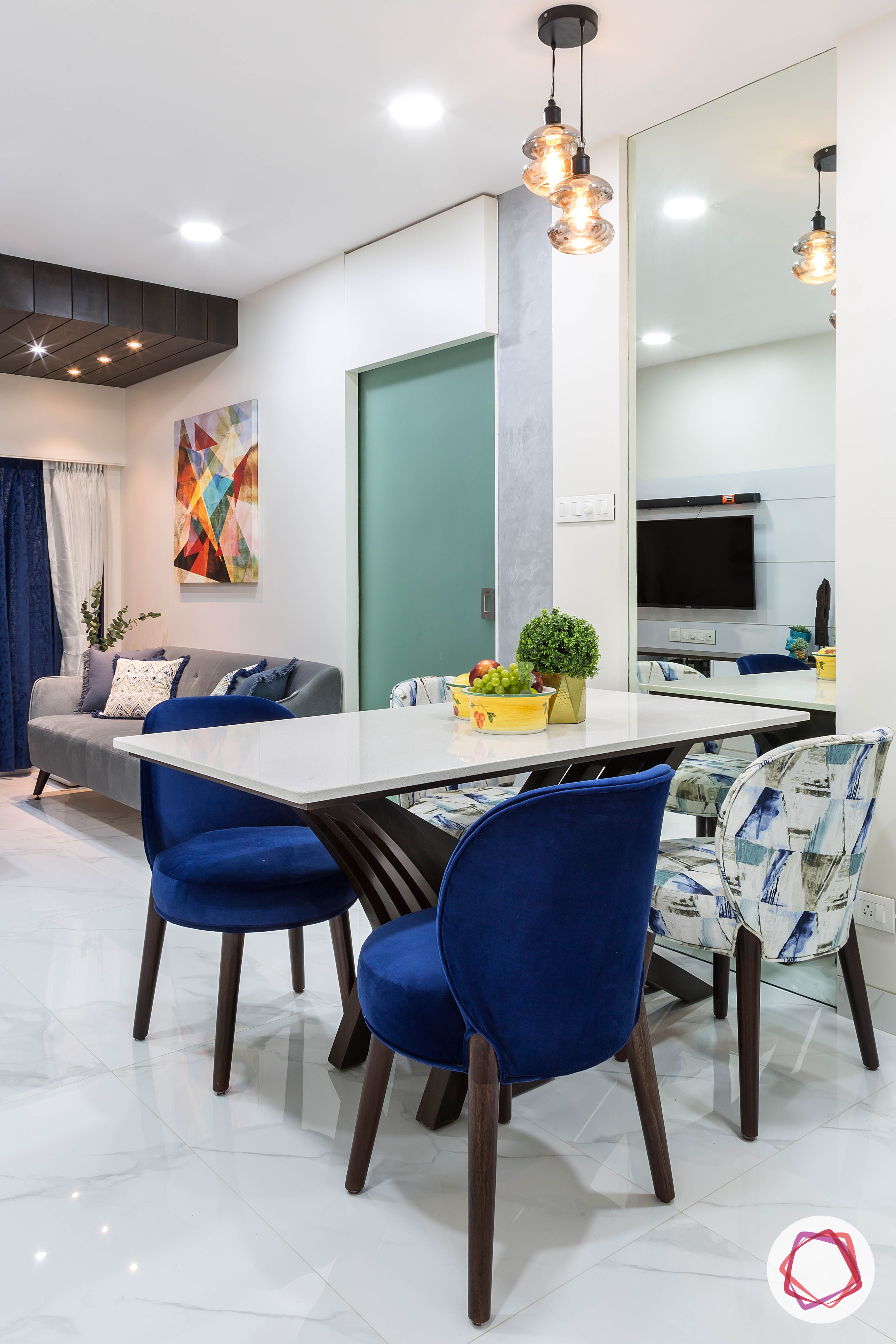 house-renovation-dining-room-stylish-kalinga-top-upholstered-chairs-pendant-lights
