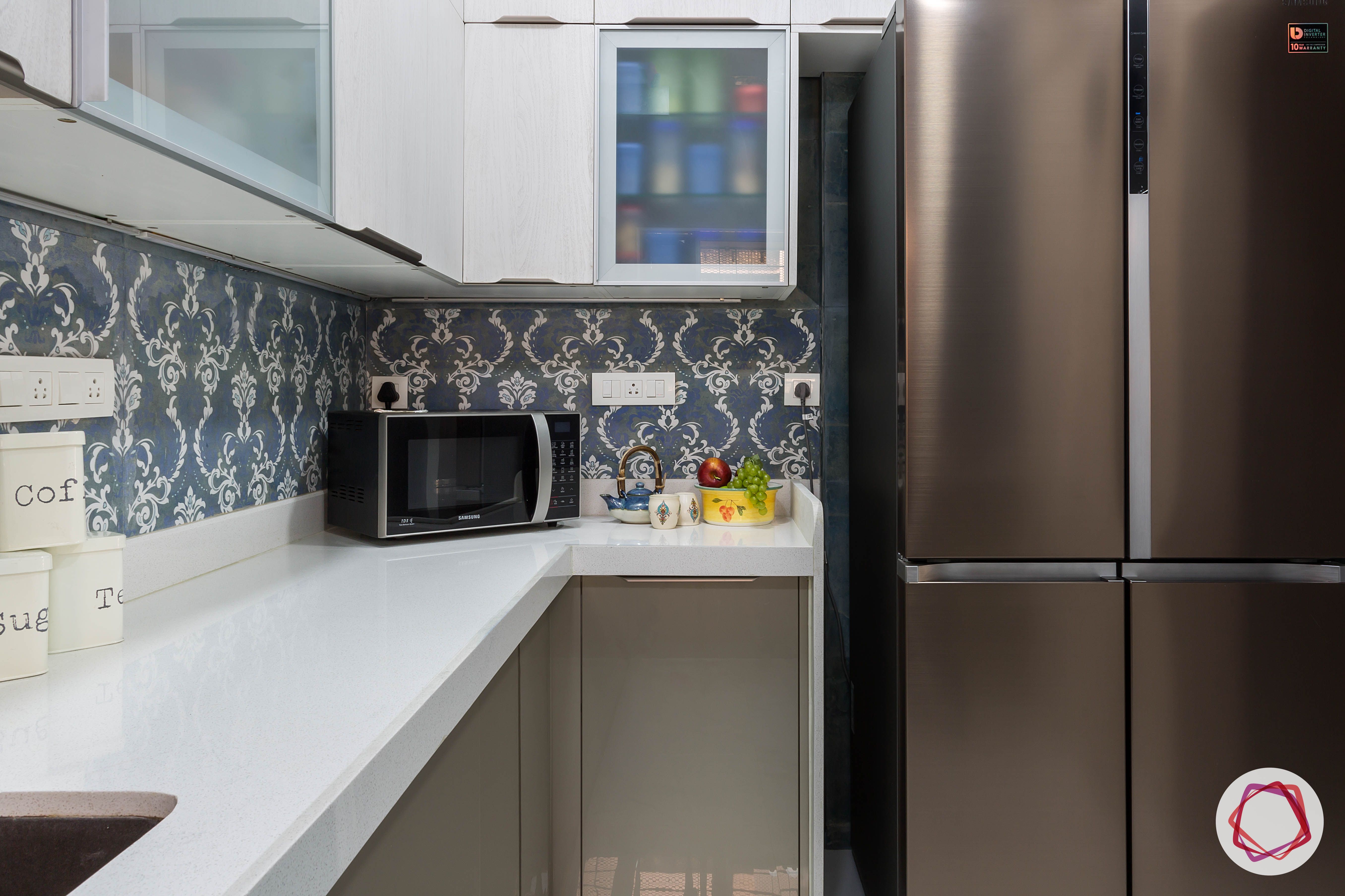 house-renovation-kitchen-cabinets-fridge-frosted-shutter-backsplash-microwave
