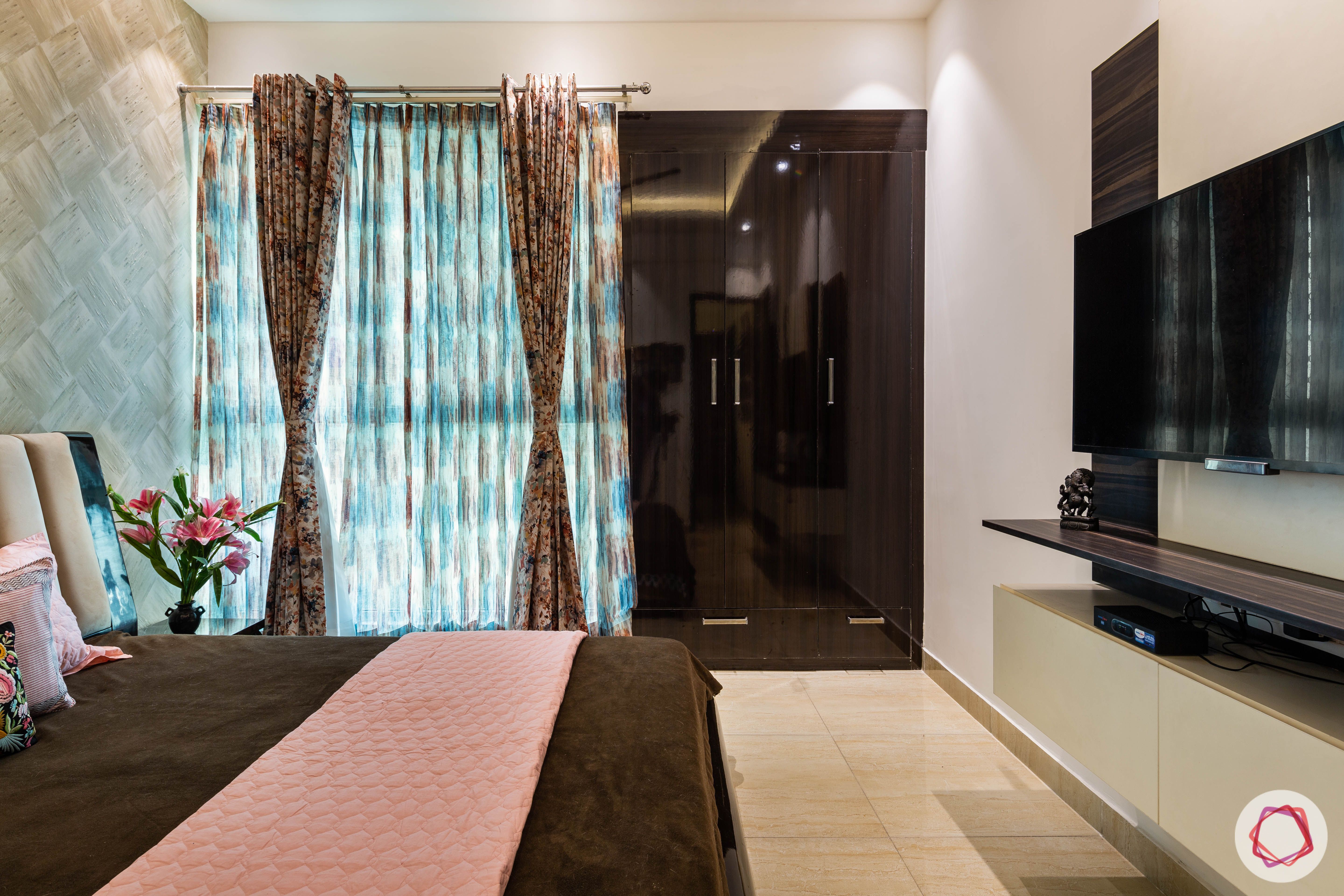 3 bhk flat-bedroom-wardrobes-printed curtains