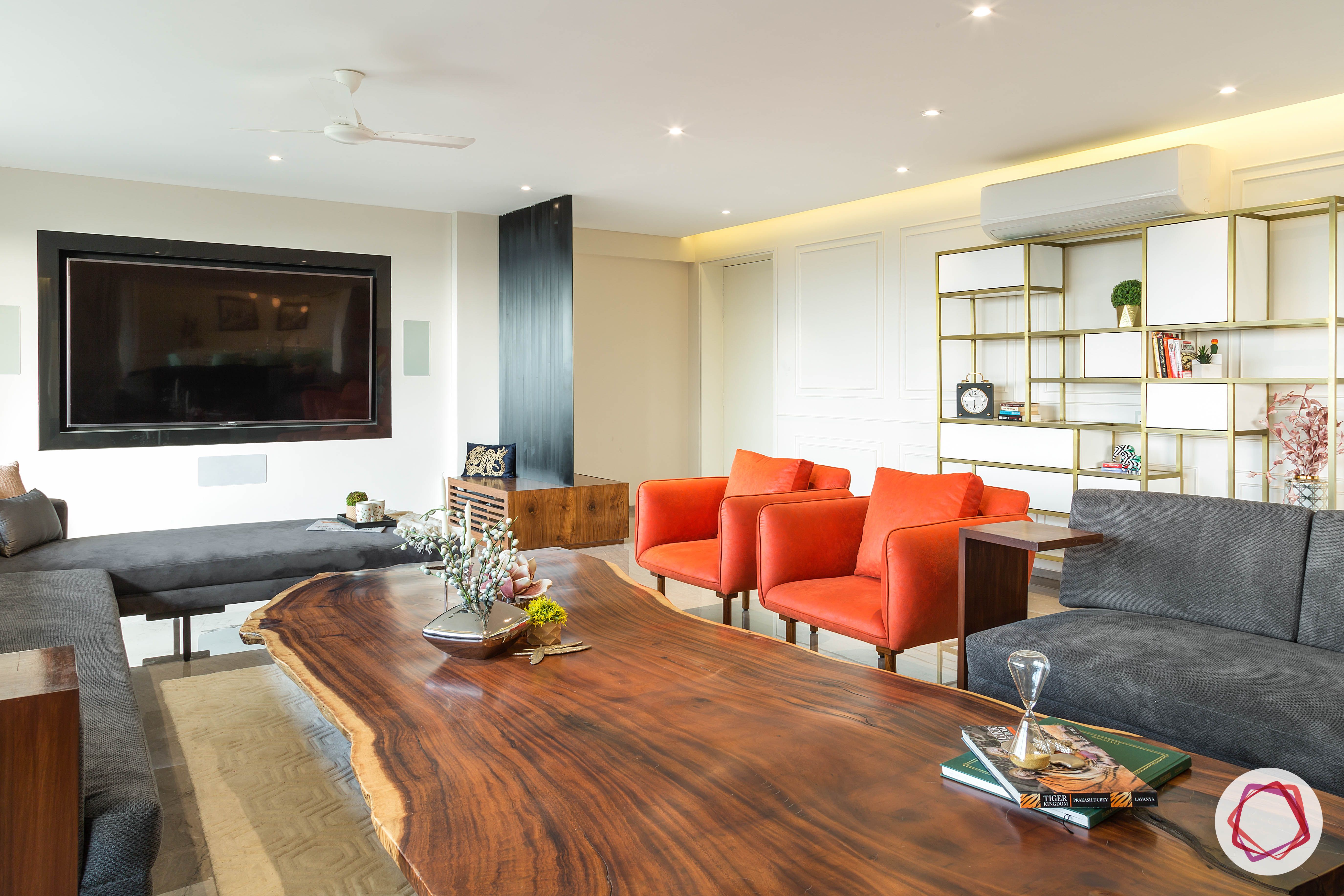 4bhk house plan-l-shaped sofa-orange armchairs-sofa designs-grey sofa-living room furniture-simple media wall
