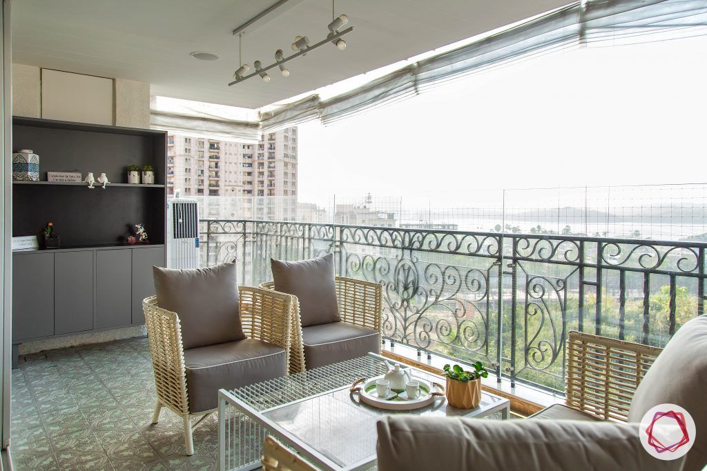 4bhk house plan-rustic floor tiles-coffee bar designs-wicker chairs-balcony seating-balcony chairs