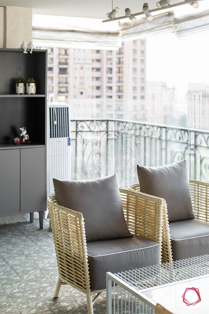4bhk house plan-rustic floor tiles-wicker chairs-balcony seating-balcony chairs-balcony floor designs- balcony flooring