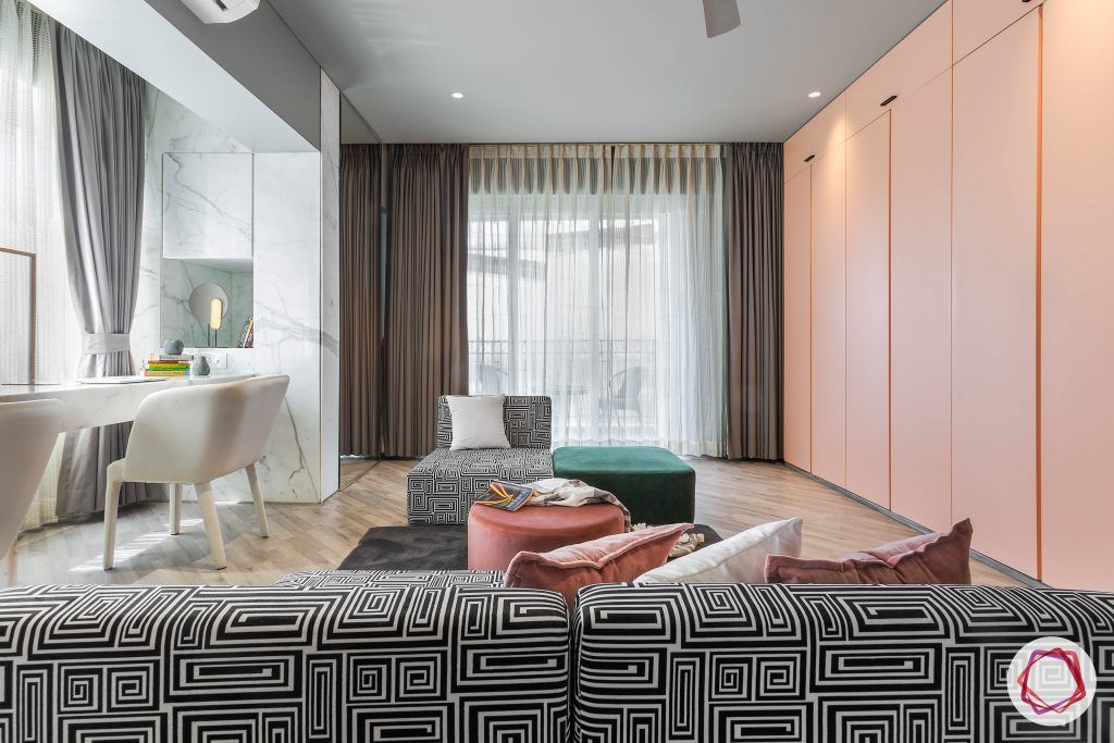 4bhk house plan-master bedroom designs-fabric loungers-monochrome couch designs-marble wall designs