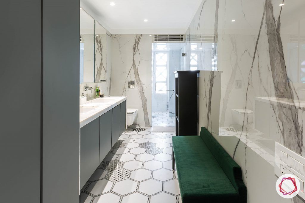 4bhk house plan-master bathroom designs-large bathroom designs-bathroom marble designs-bathroom tile designs-hexagonal tiles-bathroom seating ideas-cushioned bench designs