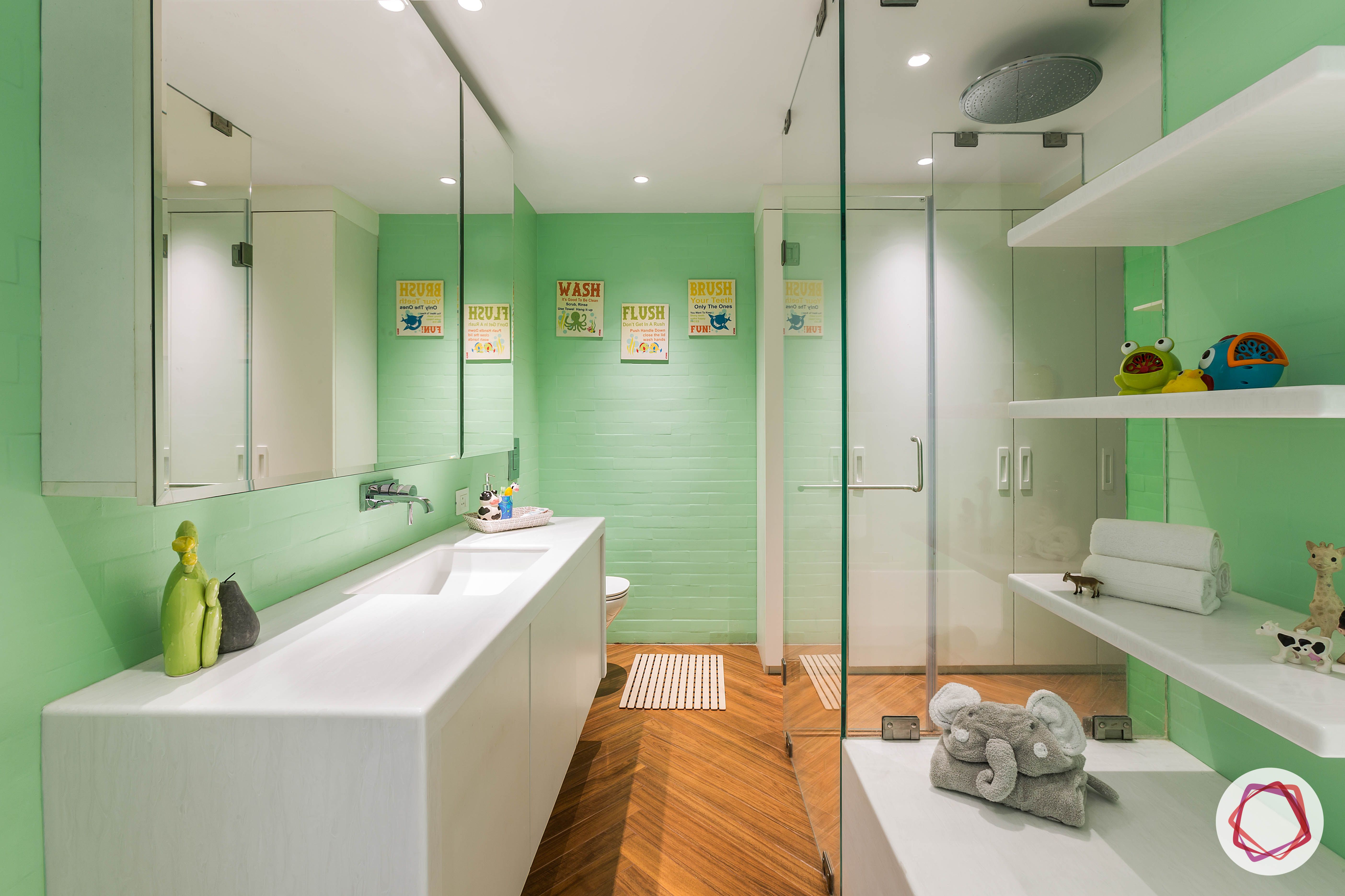 4bhk house plan-kids bathroom designs-kids bathroom-white-cabinets-mirror-wooden-floor