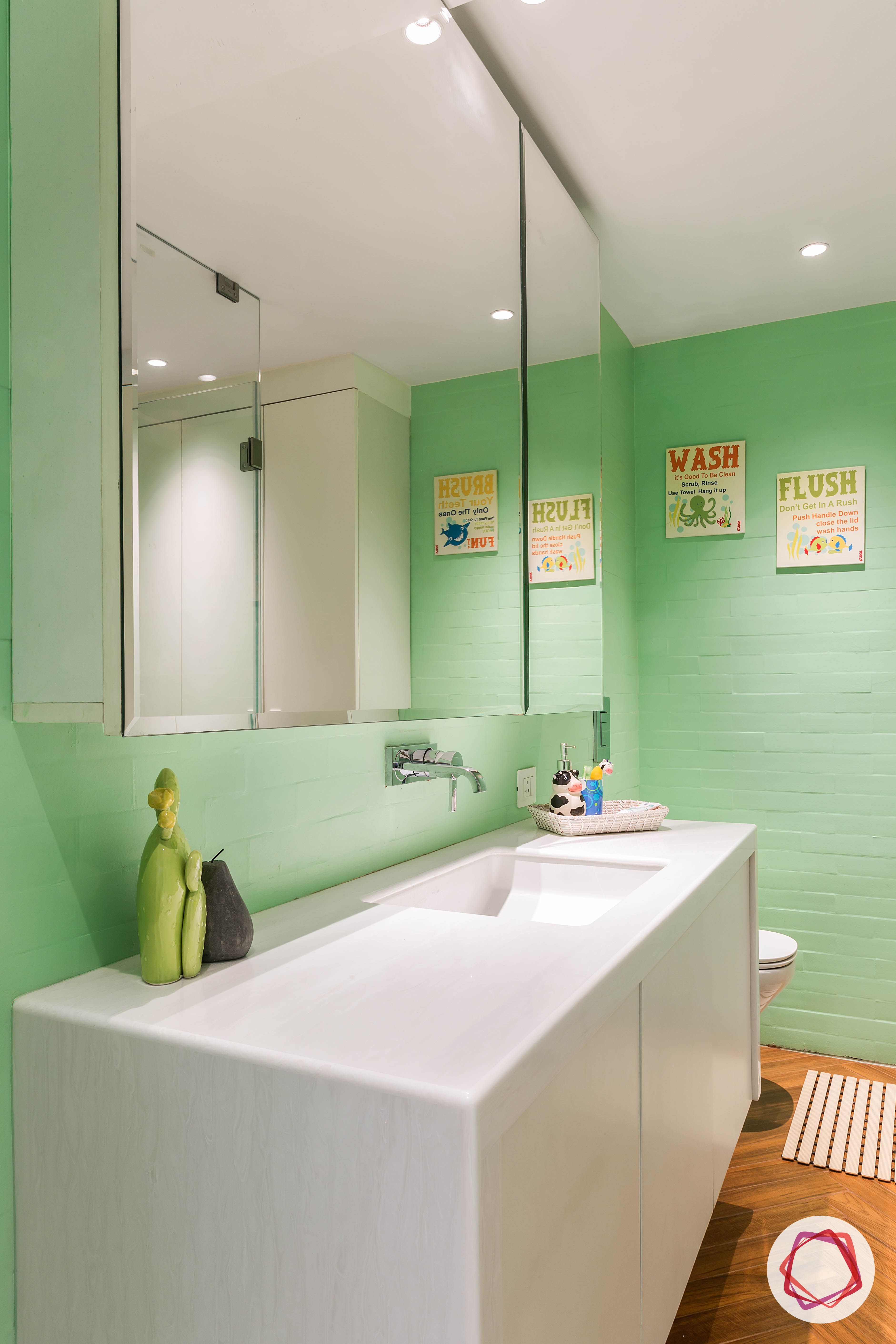 4bhk house plan-kids bathroom designs-mint-green-walls-white-cabinets