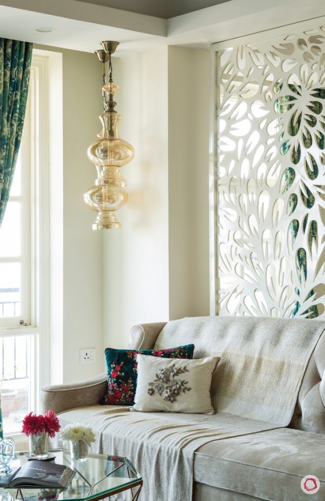 flat-in-faridabad-living-room-modern-sofa-pendant-light-throw-pillows-beige