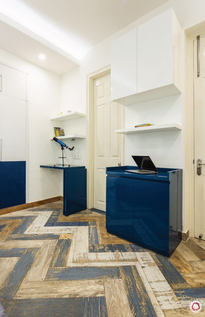 flat-in-faridabad-kids-bedroom-study-table-storage-cabinet-colourful-tiles