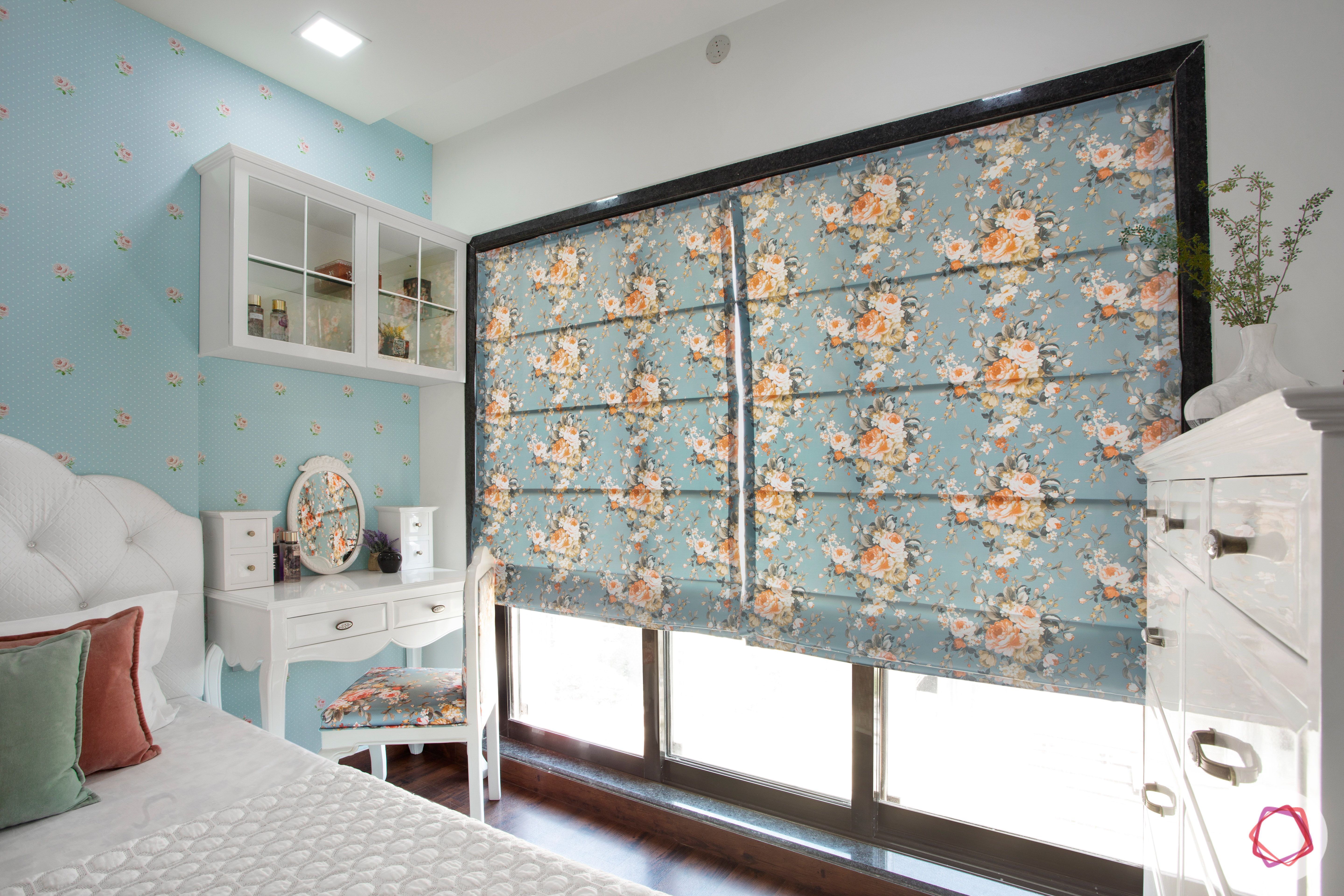 blinds-floral-bedroom-blue-wall-white-headboard-study-table-chair
