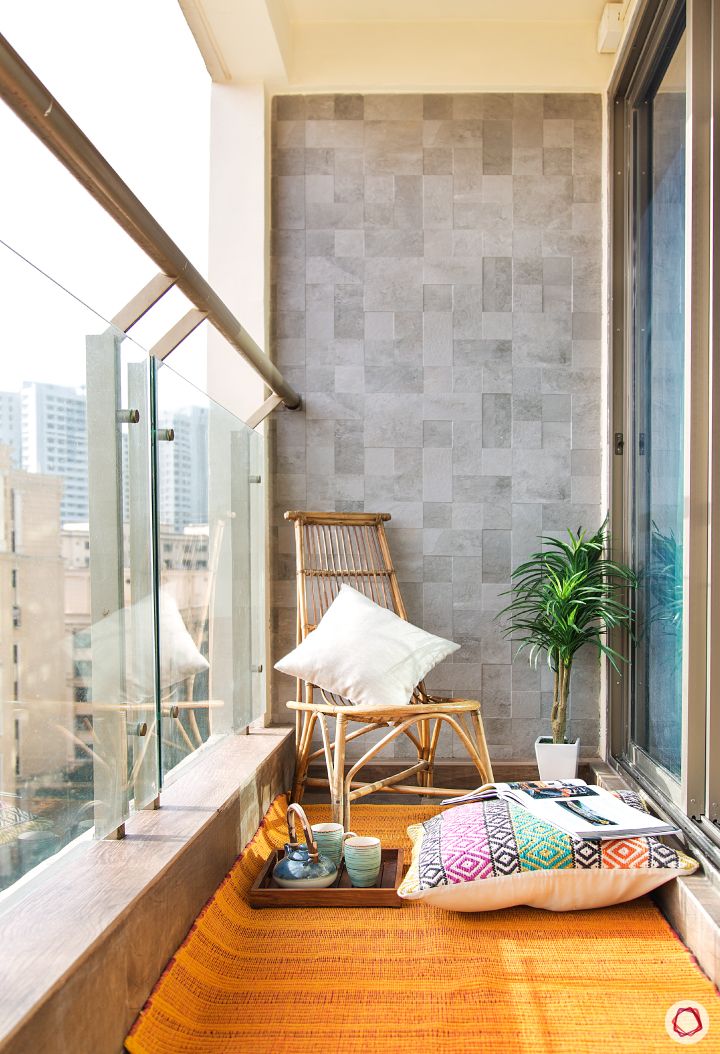 interior design questions-balcony-chair-tile-wall-rug-pillow-tea-set
