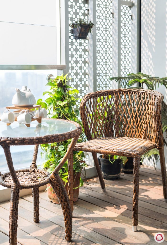 lodha-wadala-balcony-chair-table-plants-white-divider-flooring