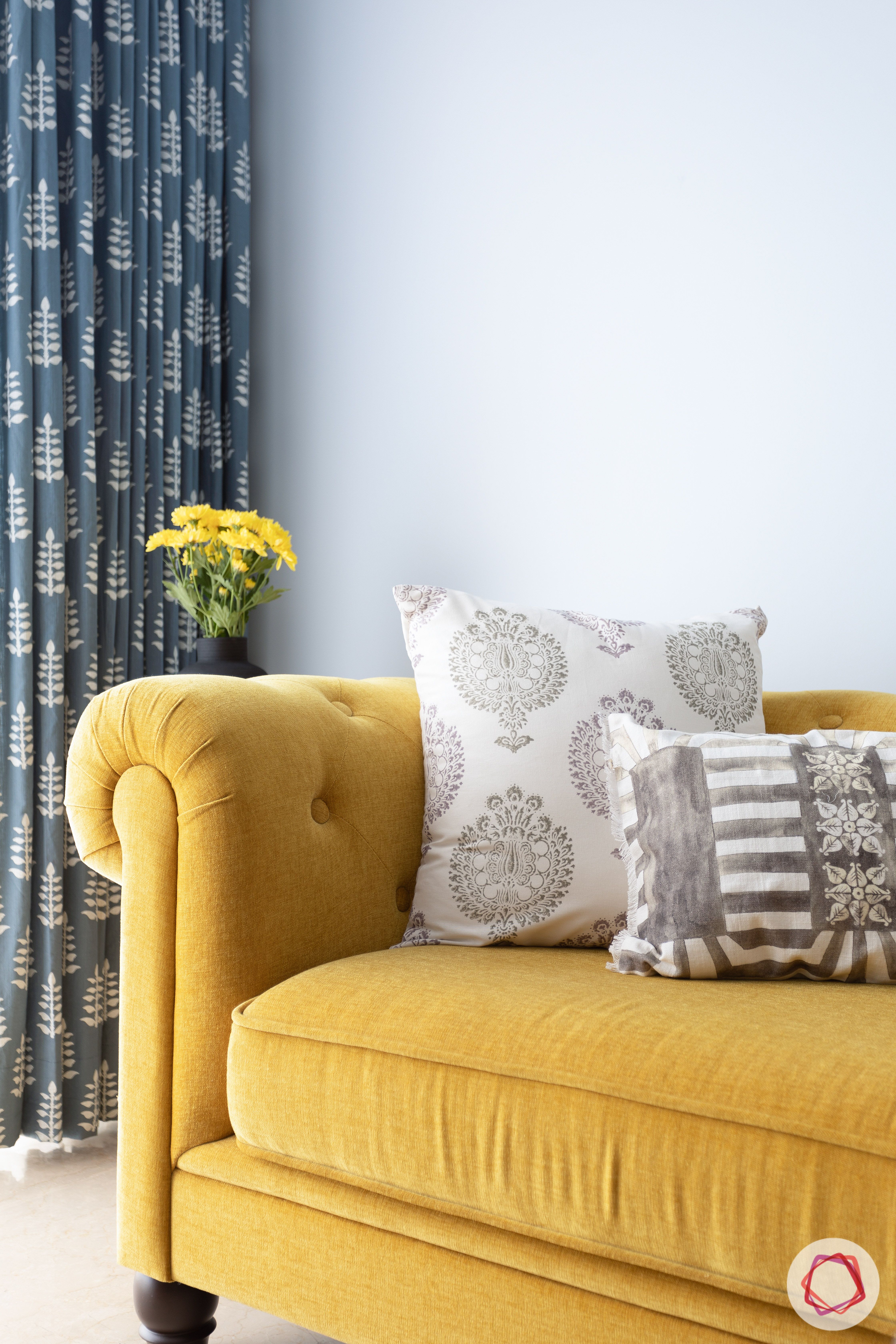 crescent bay-living room-yellow sofa-white cushions-blue curtains